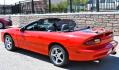 1999 Red /Black Leather Chevrolet Camaro (2G1FP32G6X2) with an 5.7L V8 MPI "LS1" engine, 6 Speed Manual transmission, located at 450 N Russell, Missoula, MT, 59801, (406) 543-6600, 46.874496, -114.017433 - Truly a beautiful car we sold this beauty about 10 years ago and was driven a few hundred miles in that time and was stored indoors Runs,drives and looks as it should all original no modifications True SS convertible with SLP upgrades (we're not certain what those are exactly as there isn't - Photo#5