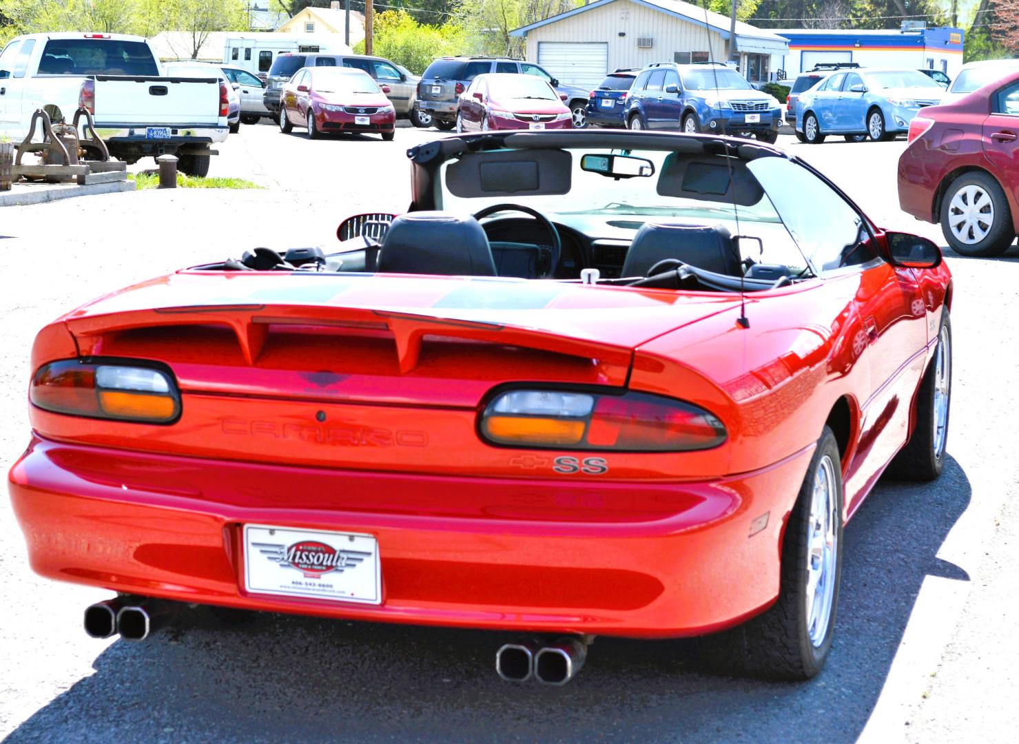 1999 Red /Black Leather Chevrolet Camaro (2G1FP32G6X2) with an 5.7L V8 MPI "LS1" engine, 6 Speed Manual transmission, located at 450 N Russell, Missoula, MT, 59801, (406) 543-6600, 46.874496, -114.017433 - Truly a beautiful car we sold this beauty about 10 years ago and was driven a few hundred miles in that time and was stored indoors Runs,drives and looks as it should all original no modifications True SS convertible with SLP upgrades (we're not certain what those are exactly as there isn't - Photo#6