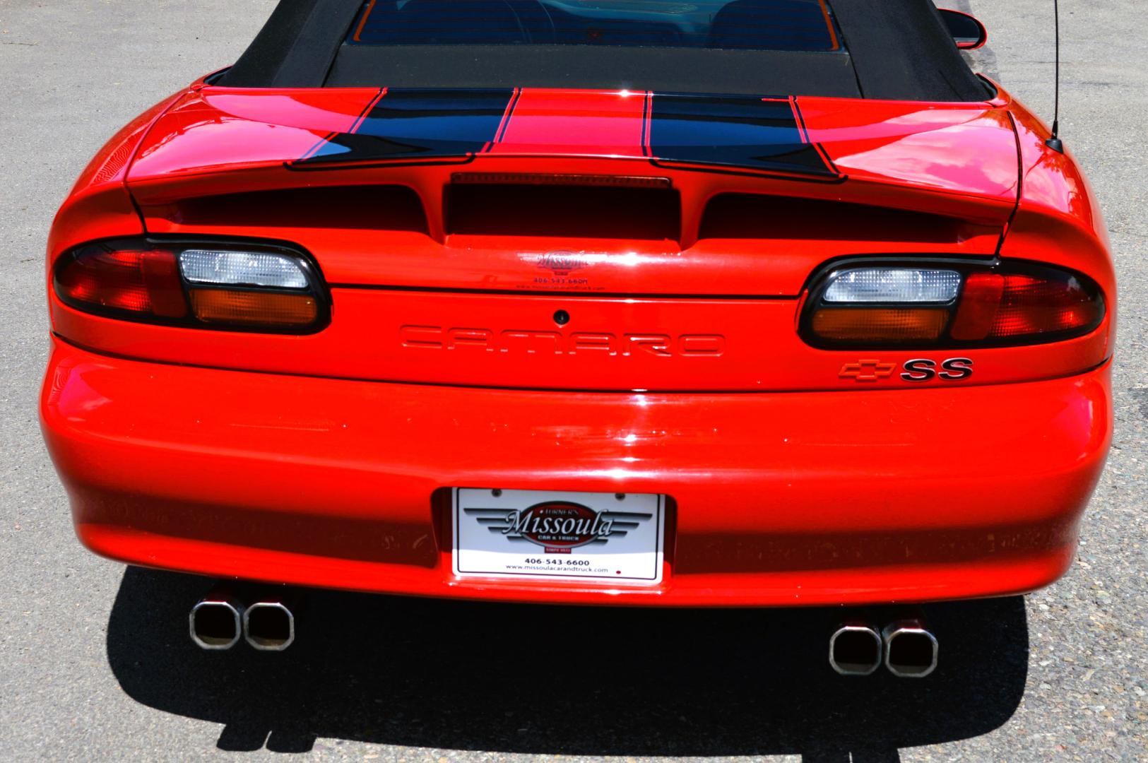 1999 Red /Black Leather Chevrolet Camaro (2G1FP32G6X2) with an 5.7L V8 MPI "LS1" engine, 6 Speed Manual transmission, located at 450 N Russell, Missoula, MT, 59801, (406) 543-6600, 46.874496, -114.017433 - Truly a beautiful car we sold this beauty about 10 years ago and was driven a few hundred miles in that time and was stored indoors Runs,drives and looks as it should all original no modifications True SS convertible with SLP upgrades (we're not certain what those are exactly as there isn't - Photo#7