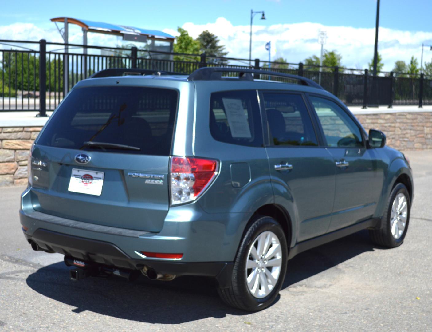 2013 Green Subaru Forester 2.5X Premium (JF2SHADC6DG) with an 2.5L H4 SOHC 16V engine, 5-Speed Manual transmission, located at 450 N Russell, Missoula, MT, 59801, (406) 543-6600, 46.874496, -114.017433 - 2013 Forester. Has Timing Chain not timing belt. 5 Speed Manual transmission. Power Sunroof. Air Conditioning. Heated Seats. Cruise. Tilt. Bluetooth. Backup Camera. - Photo#2