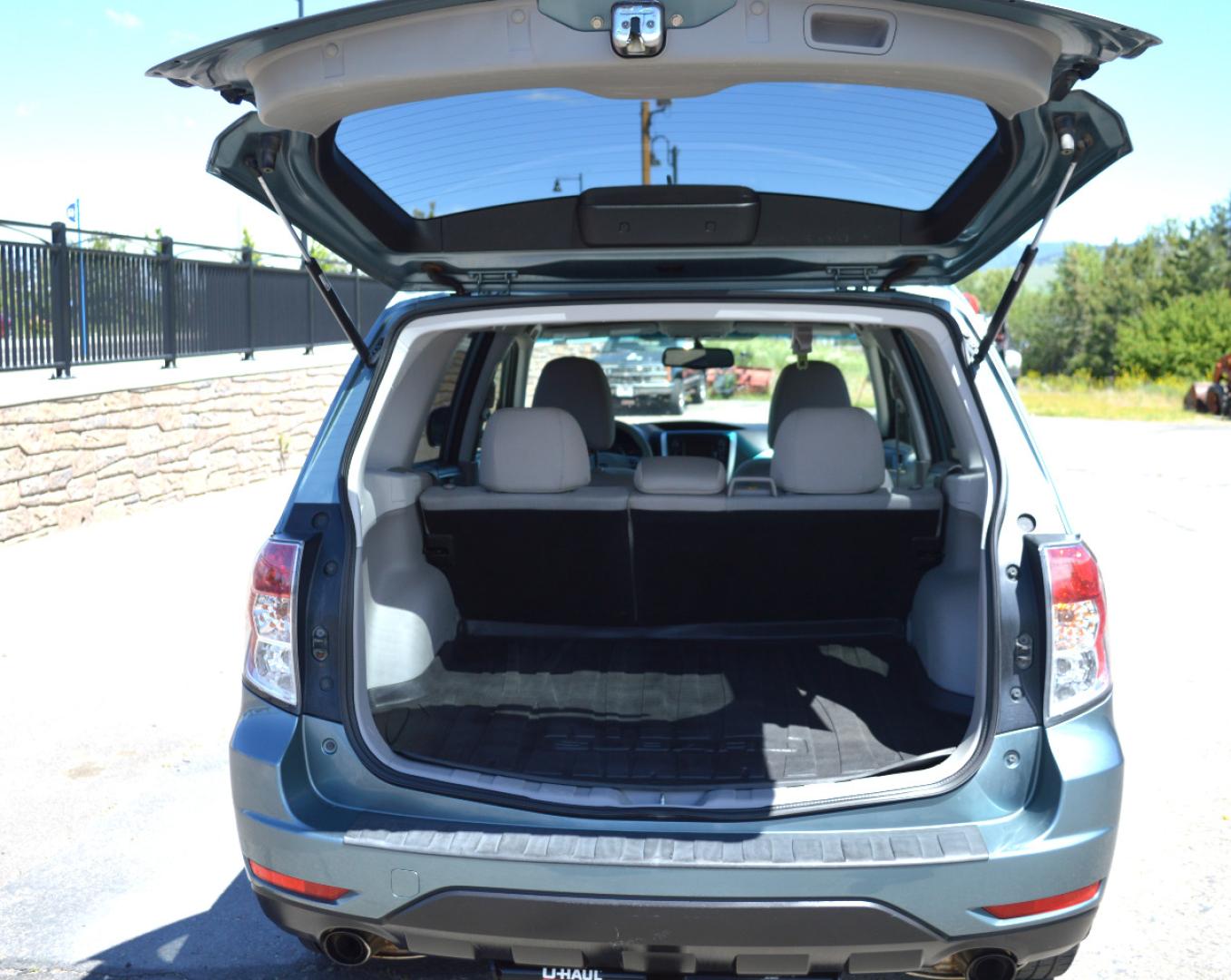 2013 Green Subaru Forester 2.5X Premium (JF2SHADC6DG) with an 2.5L H4 SOHC 16V engine, 5-Speed Manual transmission, located at 450 N Russell, Missoula, MT, 59801, (406) 543-6600, 46.874496, -114.017433 - 2013 Forester. Has Timing Chain not timing belt. 5 Speed Manual transmission. Power Sunroof. Air Conditioning. Heated Seats. Cruise. Tilt. Bluetooth. Backup Camera. - Photo#3