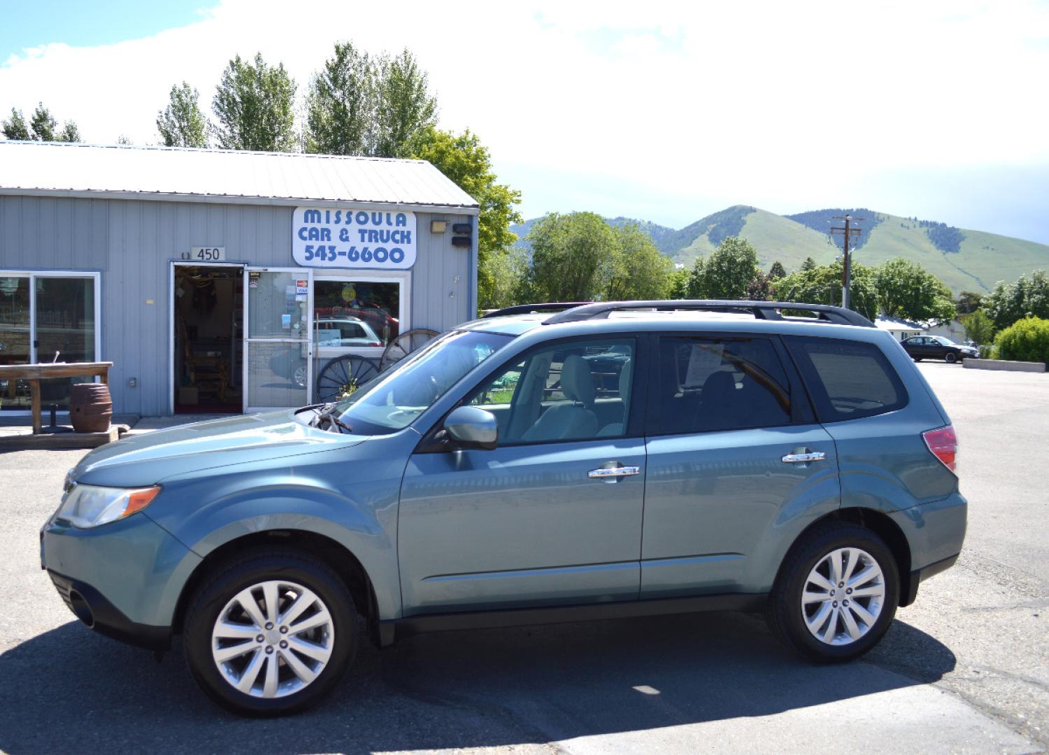 2013 Green Subaru Forester 2.5X Premium (JF2SHADC6DG) with an 2.5L H4 SOHC 16V engine, 5-Speed Manual transmission, located at 450 N Russell, Missoula, MT, 59801, (406) 543-6600, 46.874496, -114.017433 - 2013 Forester. Has Timing Chain not timing belt. 5 Speed Manual transmission. Power Sunroof. Air Conditioning. Heated Seats. Cruise. Tilt. Bluetooth. Backup Camera. - Photo#5