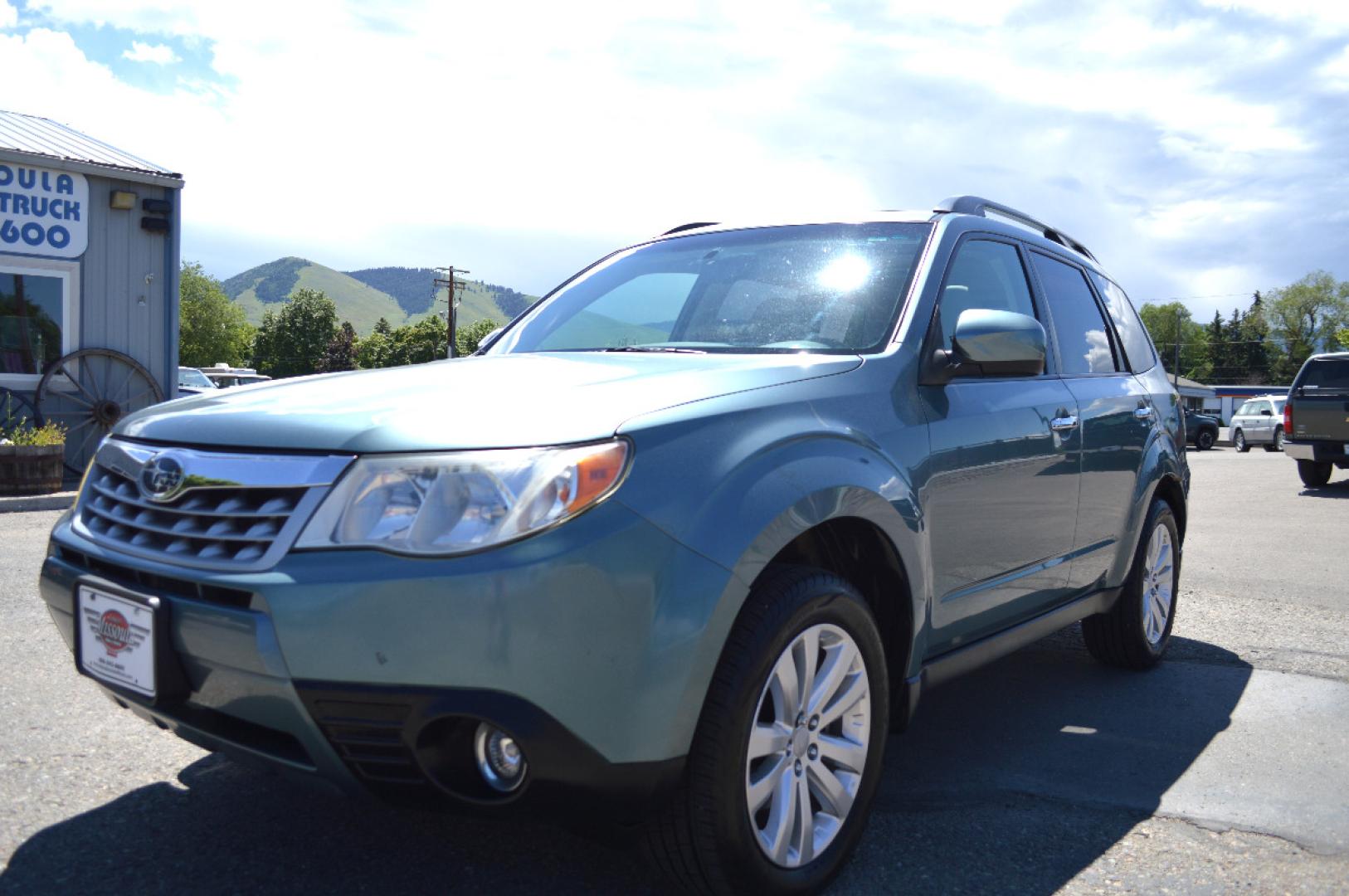 2013 Green Subaru Forester 2.5X Premium (JF2SHADC6DG) with an 2.5L H4 SOHC 16V engine, 5-Speed Manual transmission, located at 450 N Russell, Missoula, MT, 59801, (406) 543-6600, 46.874496, -114.017433 - 2013 Forester. Has Timing Chain not timing belt. 5 Speed Manual transmission. Power Sunroof. Air Conditioning. Heated Seats. Cruise. Tilt. Bluetooth. Backup Camera. - Photo#6