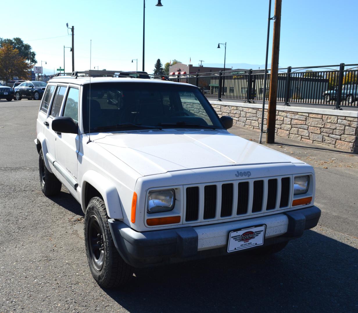 1999 White Jeep Cherokee Sport 4-Door 4WD (1J4FF68S0XL) with an 4.0L L6 OHV 12V engine, Automatic transmission, located at 450 N Russell, Missoula, MT, 59801, (406) 543-6600, 46.874496, -114.017433 - 4 Wheel Drive. Automatic Transmission. This vehicle is more then 20 years old and is not eligible for lending through our finance companies. - Photo#3