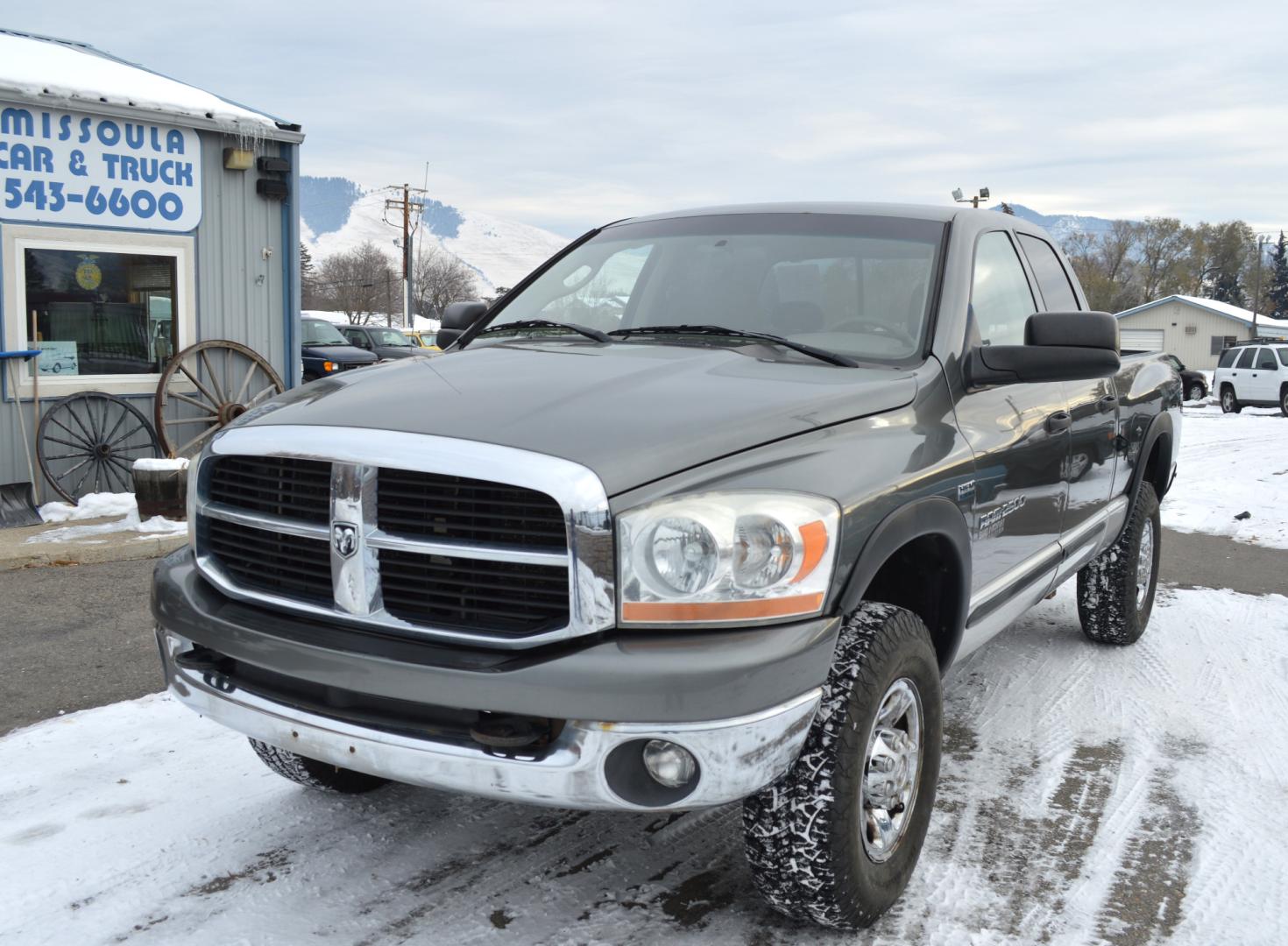 2006 Grey Dodge Ram 2500 Laramie Quad Cab 4WD (3D7KS28D56G) with an 5.7L V8 OHV 16V engine, Automatic transmission, located at 450 N Russell, Missoula, MT, 59801, (406) 543-6600, 46.874496, -114.017433 - Nice Truck. High miles but runs great. 4 Wheel Drive. Good Tires. Automatic Transmission. Air Conditioning. Power Windows and Locks. Cruise. Tilt. - Photo#1