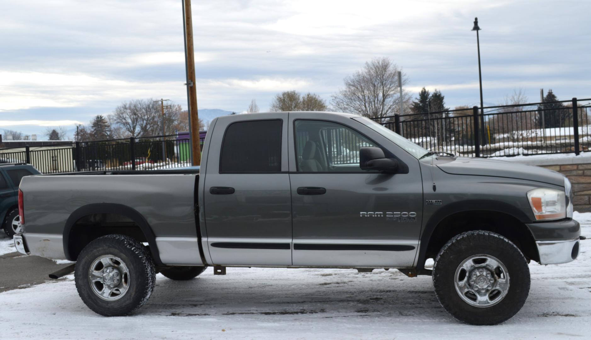 2006 Grey Dodge Ram 2500 Laramie Quad Cab 4WD (3D7KS28D56G) with an 5.7L V8 OHV 16V engine, Automatic transmission, located at 450 N Russell, Missoula, MT, 59801, (406) 543-6600, 46.874496, -114.017433 - Nice Truck. High miles but runs great. 4 Wheel Drive. Good Tires. Automatic Transmission. Air Conditioning. Power Windows and Locks. Cruise. Tilt. - Photo#2