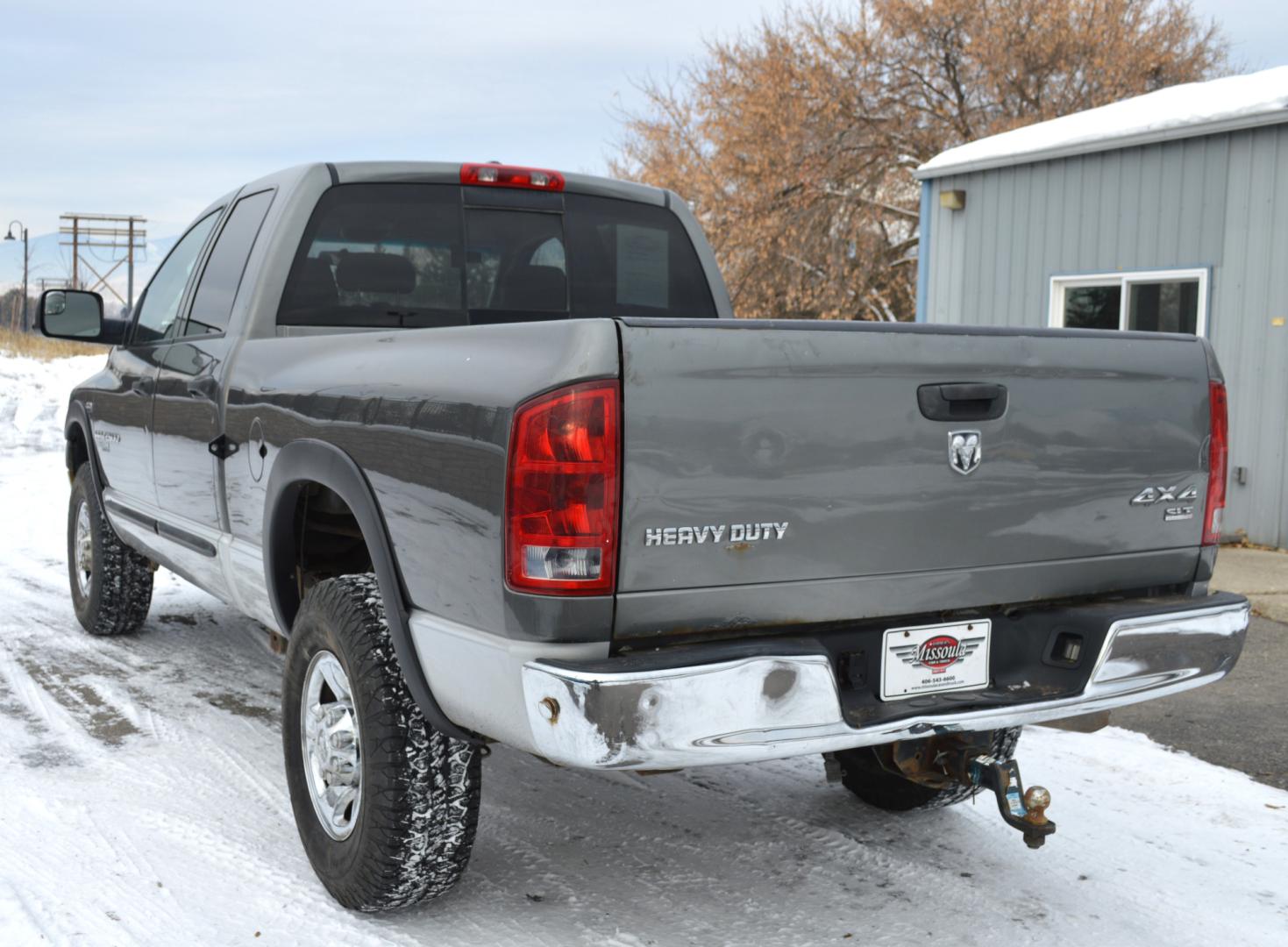 2006 Grey Dodge Ram 2500 Laramie Quad Cab 4WD (3D7KS28D56G) with an 5.7L V8 OHV 16V engine, Automatic transmission, located at 450 N Russell, Missoula, MT, 59801, (406) 543-6600, 46.874496, -114.017433 - Nice Truck. High miles but runs great. 4 Wheel Drive. Good Tires. Automatic Transmission. Air Conditioning. Power Windows and Locks. Cruise. Tilt. - Photo#5