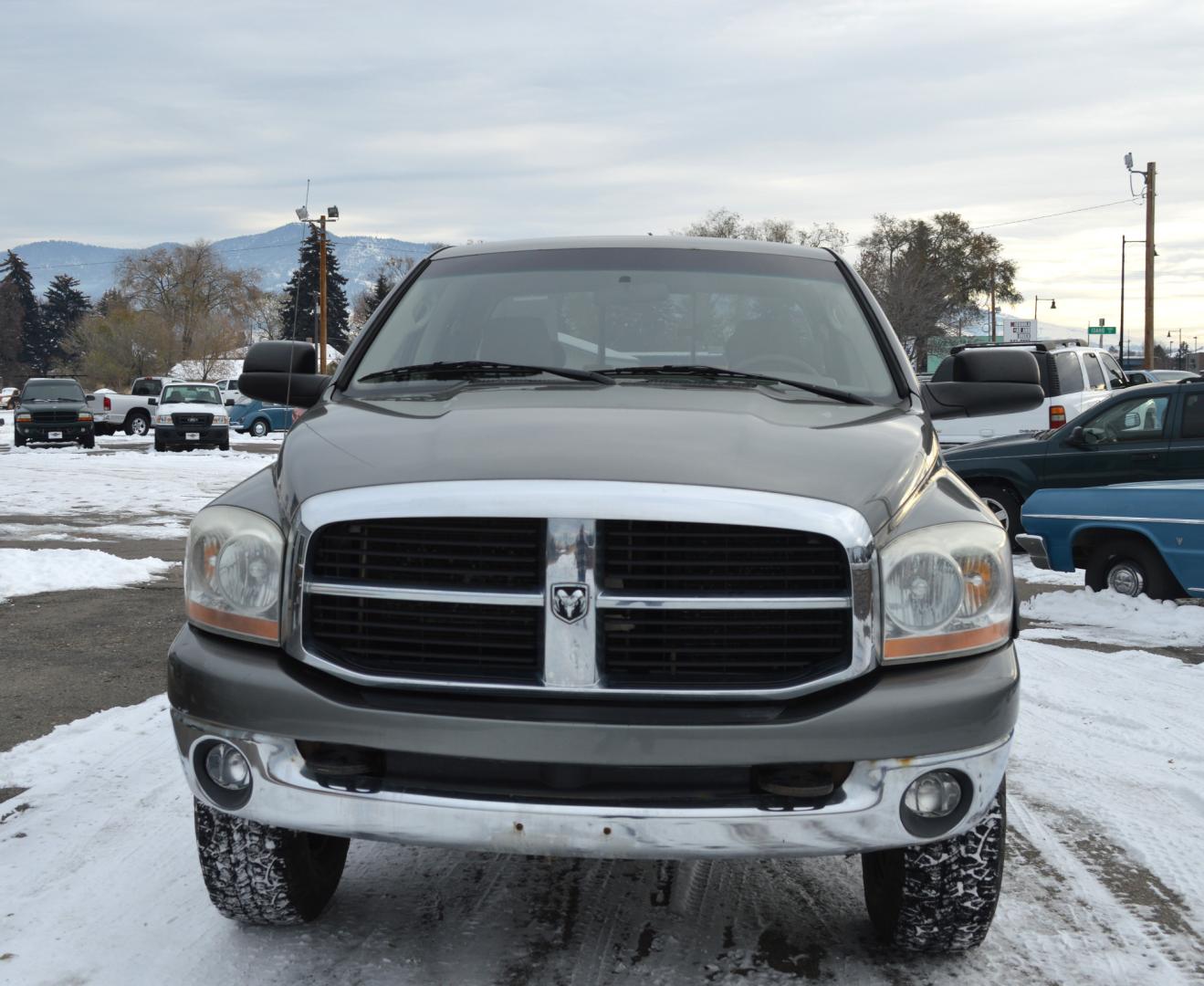 2006 Grey Dodge Ram 2500 Laramie Quad Cab 4WD (3D7KS28D56G) with an 5.7L V8 OHV 16V engine, Automatic transmission, located at 450 N Russell, Missoula, MT, 59801, (406) 543-6600, 46.874496, -114.017433 - Nice Truck. High miles but runs great. 4 Wheel Drive. Good Tires. Automatic Transmission. Air Conditioning. Power Windows and Locks. Cruise. Tilt. - Photo#6