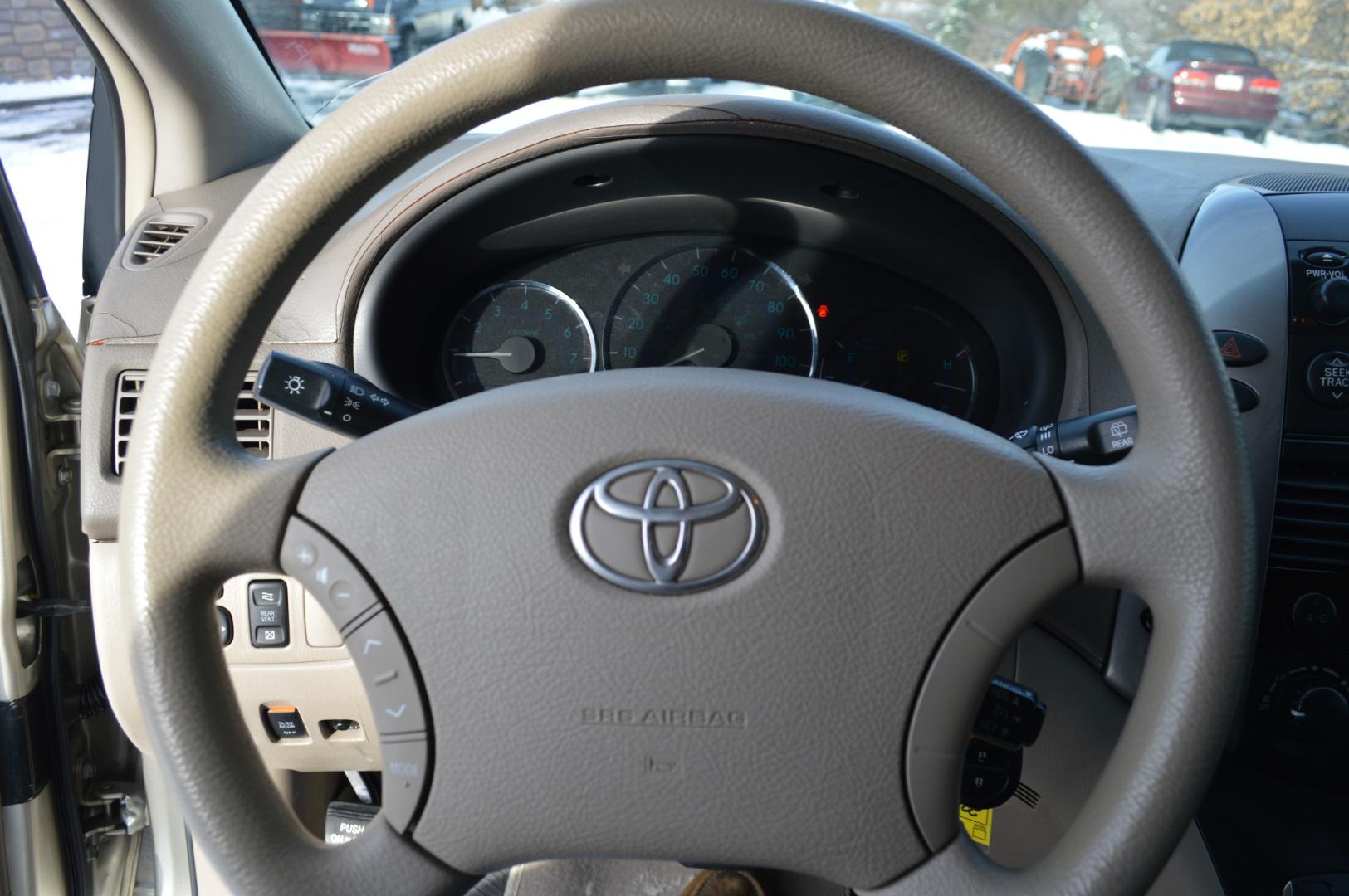 2008 Gold Toyota Sienna CE FWD 7-Passenger Seating (5TDZK23C18S) with an 3.5L V6 EFI DOHC 24V engine, 5-Speed Automatic Overdrive transmission, located at 450 N Russell, Missoula, MT, 59801, (406) 543-6600, 46.874496, -114.017433 - Great running 7 Passenger Van. Air Conditioning. Power Windows and Locks. One of the Sliding Doors is Powered. Dash is a little rough. - Photo#10