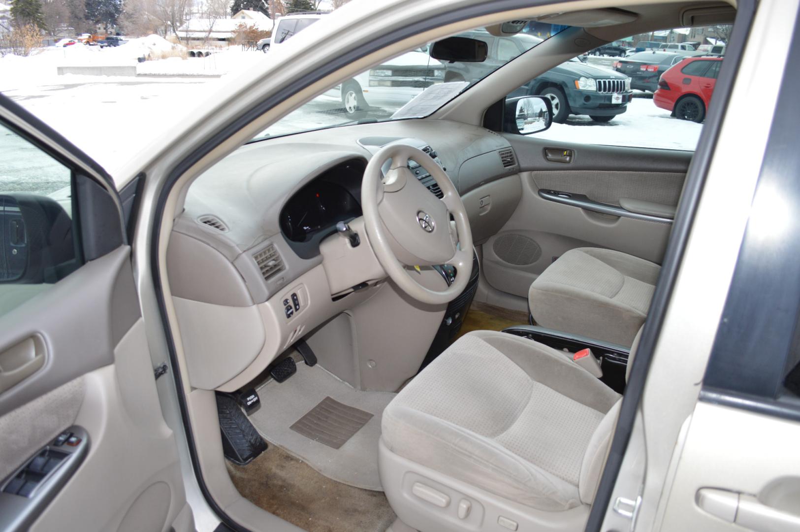 2008 Gold Toyota Sienna CE FWD 7-Passenger Seating (5TDZK23C18S) with an 3.5L V6 EFI DOHC 24V engine, 5-Speed Automatic Overdrive transmission, located at 450 N Russell, Missoula, MT, 59801, (406) 543-6600, 46.874496, -114.017433 - Great running 7 Passenger Van. Air Conditioning. Power Windows and Locks. One of the Sliding Doors is Powered. Dash is a little rough. - Photo#12