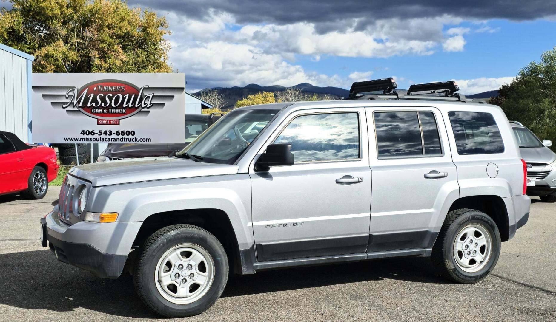 2015 Silver Jeep Patriot Sport 4WD (1C4NJRBB0FD) with an 2.4L L4 DOHC 16V engine, Automatic transmission, located at 450 N Russell, Missoula, MT, 59801, (406) 543-6600, 46.874496, -114.017433 - Nice Clean SUV. 4 Wheel Drive. Automatic Transmission. Air. Cruise. Tilt. Power Windows. - Photo#0