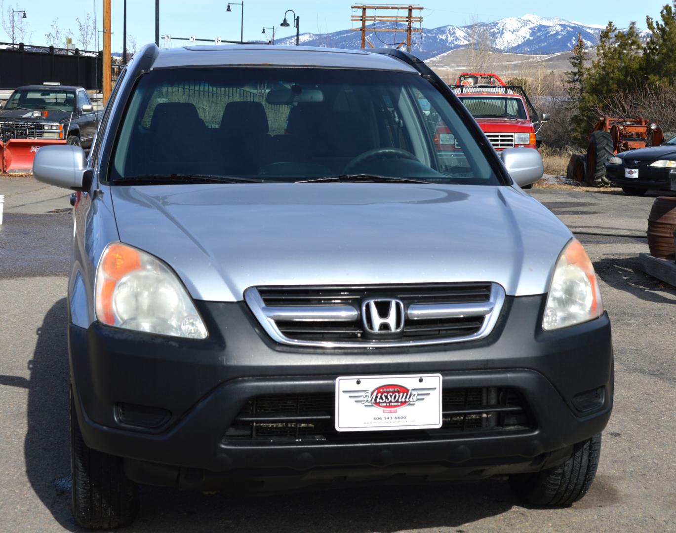 2004 Silver Honda CR-V EX 4WD (JHLRD77814C) with an 2.4L L4 DOHC 16V engine, 5-Speed Manual Overdrive transmission, located at 450 N Russell, Missoula, MT, 59801, (406) 543-6600, 46.874496, -114.017433 - Runs Great. New Clutch. Power Sunroof. Hard to find 5 Speed. ! Very clean All Wheel Drive. Air Conditioning. Power Windows. Cruise. - Photo#2