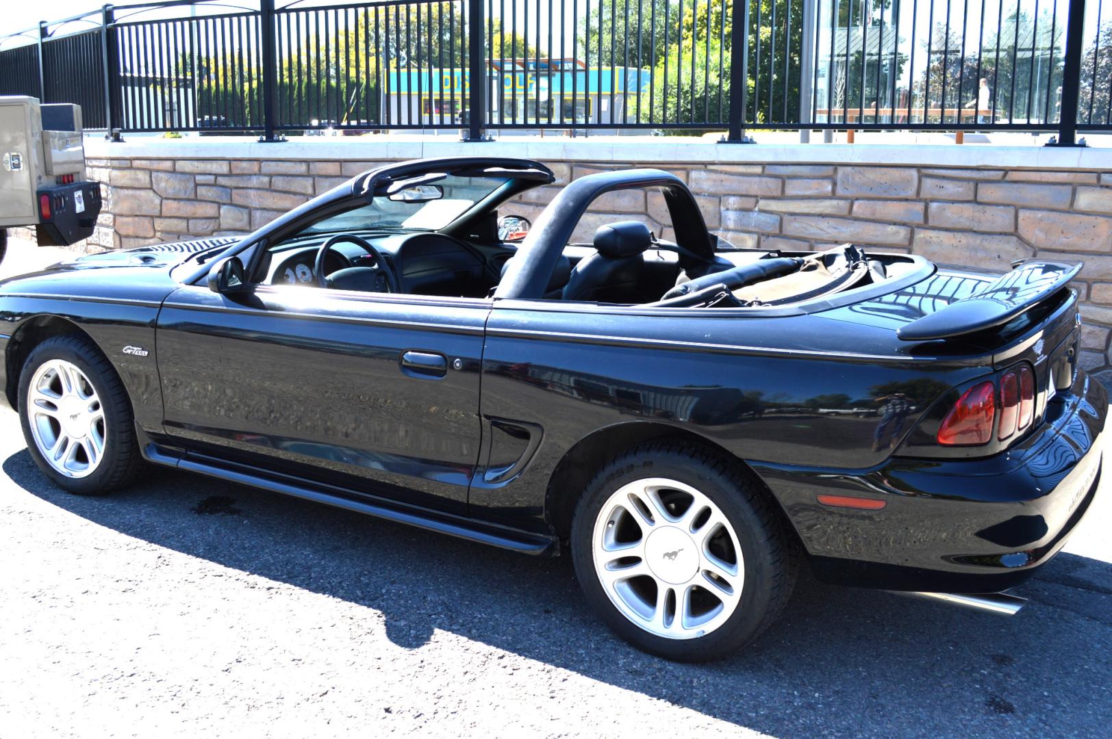 1998 Black Ford Mustang GT Convertible (1FAFP45X0WF) with an 4.6L V8 SOHC 16V engine, Automatic transmission, located at 450 N Russell, Missoula, MT, 59801, (406) 543-6600, 46.874496, -114.017433 - Photo#2