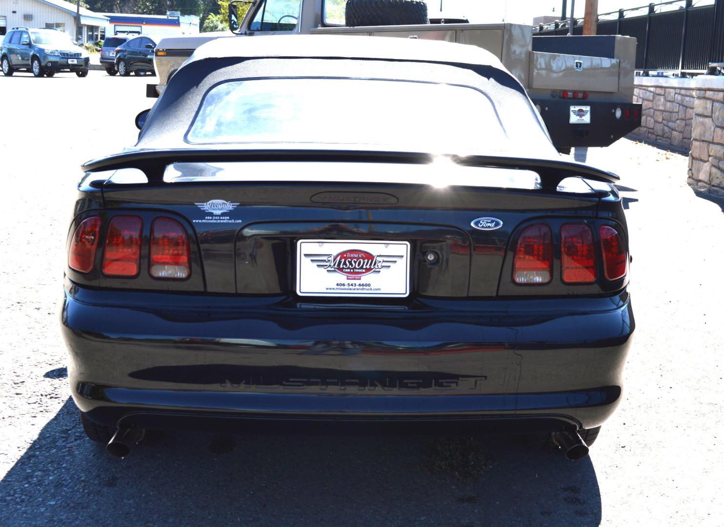 1998 Black Ford Mustang GT Convertible (1FAFP45X0WF) with an 4.6L V8 SOHC 16V engine, Automatic transmission, located at 450 N Russell, Missoula, MT, 59801, (406) 543-6600, 46.874496, -114.017433 - Brand New Convertible Top goes up and down great. Automatic Transmission. Air. Cruise. Tilt. This vehicle is more then 20 years old and is not eligible for lending through our finance companies. - Photo#5