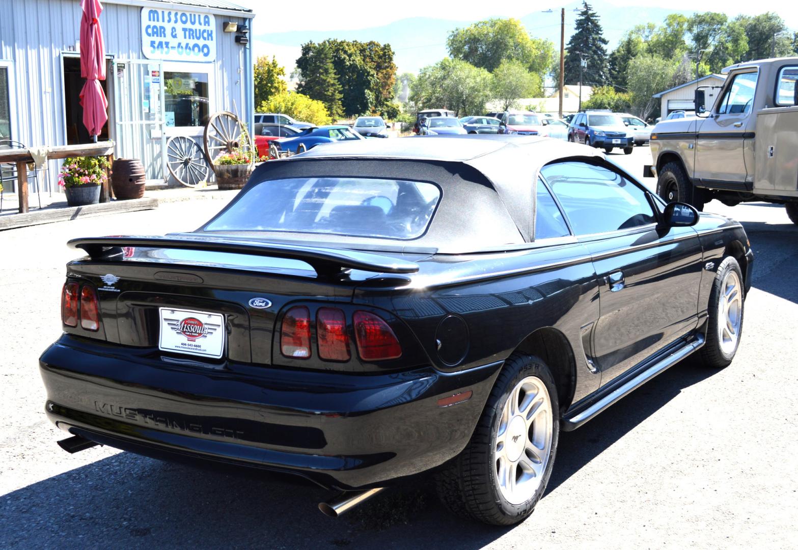 1998 Black Ford Mustang GT Convertible (1FAFP45X0WF) with an 4.6L V8 SOHC 16V engine, Automatic transmission, located at 450 N Russell, Missoula, MT, 59801, (406) 543-6600, 46.874496, -114.017433 - Brand New Convertible Top goes up and down great. Automatic Transmission. Air. Cruise. Tilt. This vehicle is more then 20 years old and is not eligible for lending through our finance companies. - Photo#6