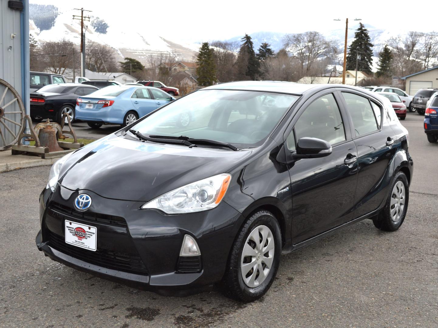 2012 Black Toyota Prius c One (JTDKDTB31C1) with an 1.5L L4 DOHC 16V HYBRID engine, Continuously Variable Transmission transmission, located at 450 N Russell, Missoula, MT, 59801, (406) 543-6600, 46.874496, -114.017433 - Nice Little Hybrid. Great Fuel Economy. Air. Cruise. Tilt. Bluetooth. Power Windows and Locks. - Photo#1