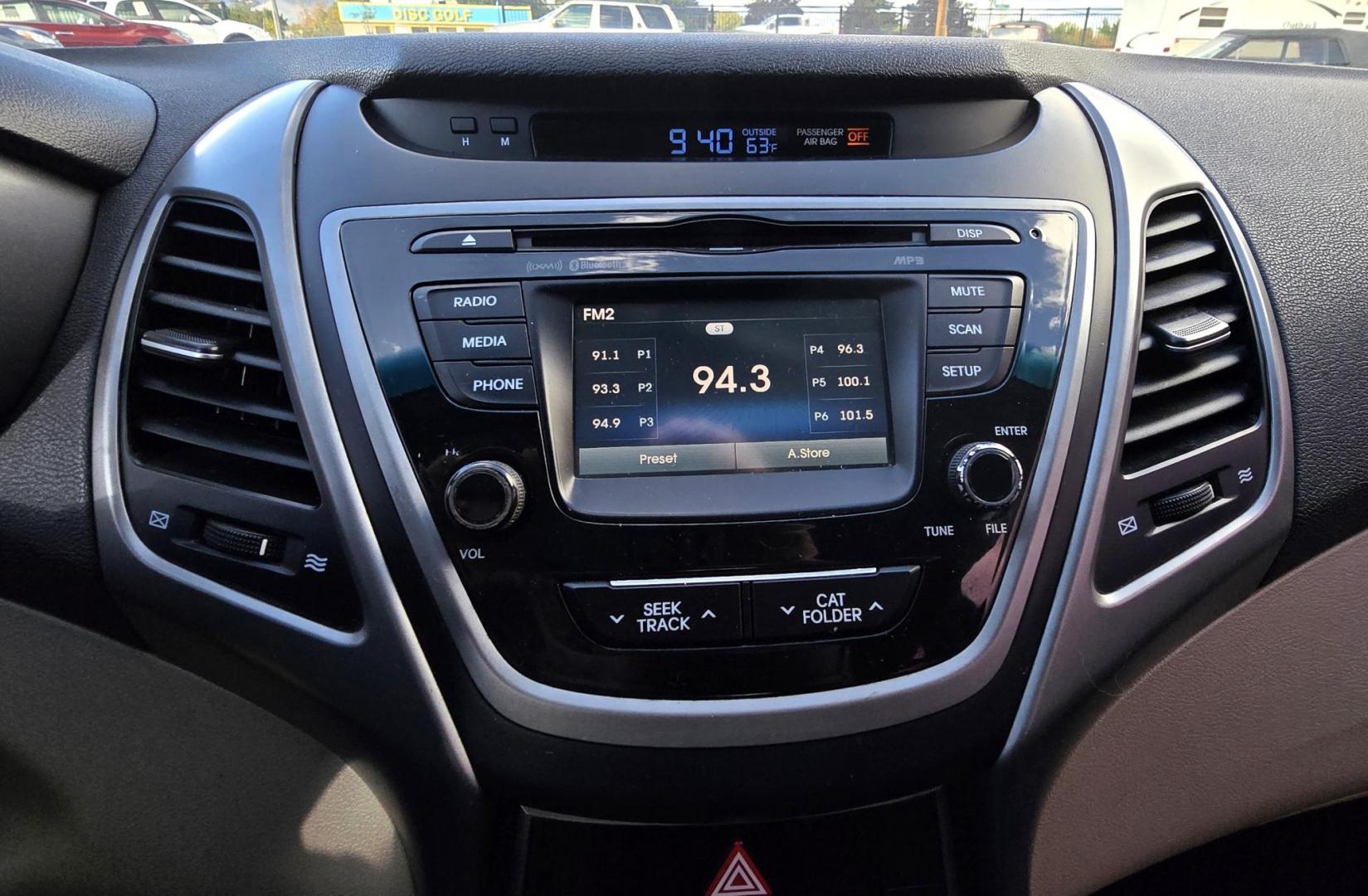 2016 Black Hyundai Elantra Limited (5NPDH4AE9GH) with an 1.8L L4 DOHC 16V engine, 6-Speed Automatic transmission, located at 450 N Russell, Missoula, MT, 59801, (406) 543-6600, 46.874496, -114.017433 - Great Running Sedan. Automatic Transmission. Air. Cruise. Tilt. Backup Camera. Bluetooth. Power Windows and Locks. - Photo#11