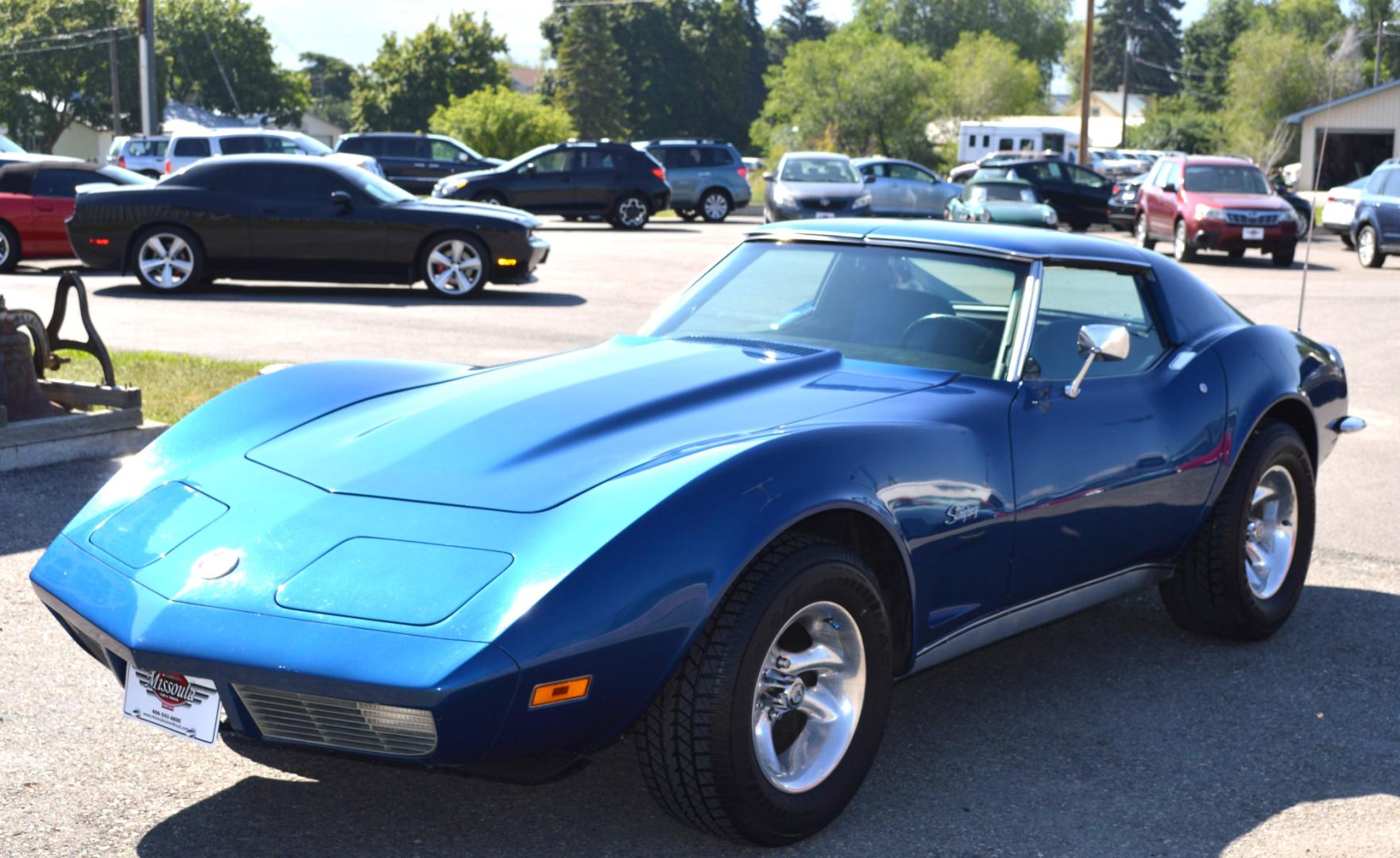 1973 Blue /Black Chevrolet Corvette Stingray (1Z37J3S4290) with an 350 engine, 4-Speed Manual transmission, located at 450 N Russell, Missoula, MT, 59801, (406) 543-6600, 46.874496, -114.017433 - Classy Looking Vette. Beautiful Blue. 4 Speed Manual Transmission. 350 Engine This vehicle is more then 20 years old and is not eligible for lending through our finance companies. - Photo#5