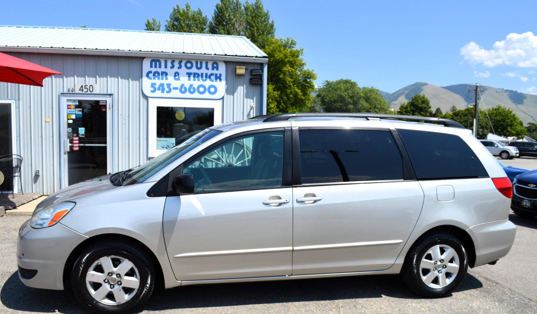 2004 Silver Toyota Sienna LE - 7 Passenger (5TDZA23C04S) with an 3.3L V6 DOHC 24V engine, 5-Speed Automatic Overdrive transmission, located at 450 N Russell, Missoula, MT, 59801, (406) 543-6600, 46.874496, -114.017433 - 3rd Row Seating. Rear Entertainment. Air. Cruise. Tilt. Power Windows. - Photo#0