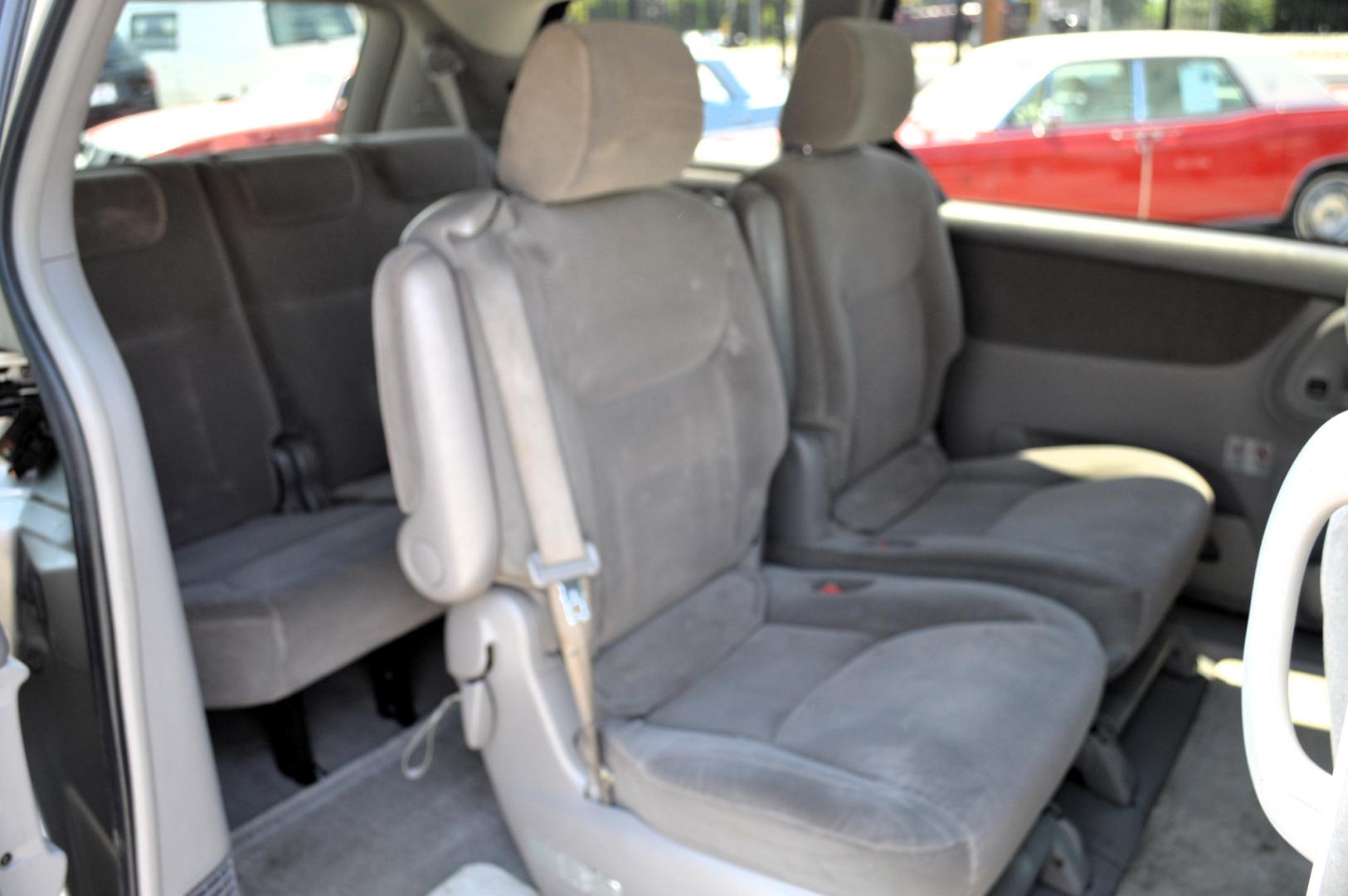 2004 Silver Toyota Sienna LE - 7 Passenger (5TDZA23C04S) with an 3.3L V6 DOHC 24V engine, 5-Speed Automatic Overdrive transmission, located at 450 N Russell, Missoula, MT, 59801, (406) 543-6600, 46.874496, -114.017433 - 3rd Row Seating. Rear Entertainment. Air. Cruise. Tilt. Power Windows. - Photo#9