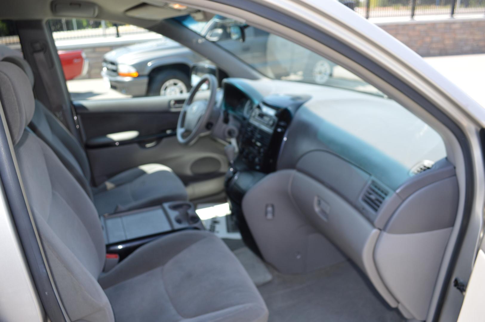 2004 Silver Toyota Sienna LE - 7 Passenger (5TDZA23C04S) with an 3.3L V6 DOHC 24V engine, 5-Speed Automatic Overdrive transmission, located at 450 N Russell, Missoula, MT, 59801, (406) 543-6600, 46.874496, -114.017433 - 3rd Row Seating. Rear Entertainment. Air. Cruise. Tilt. Power Windows. - Photo#10