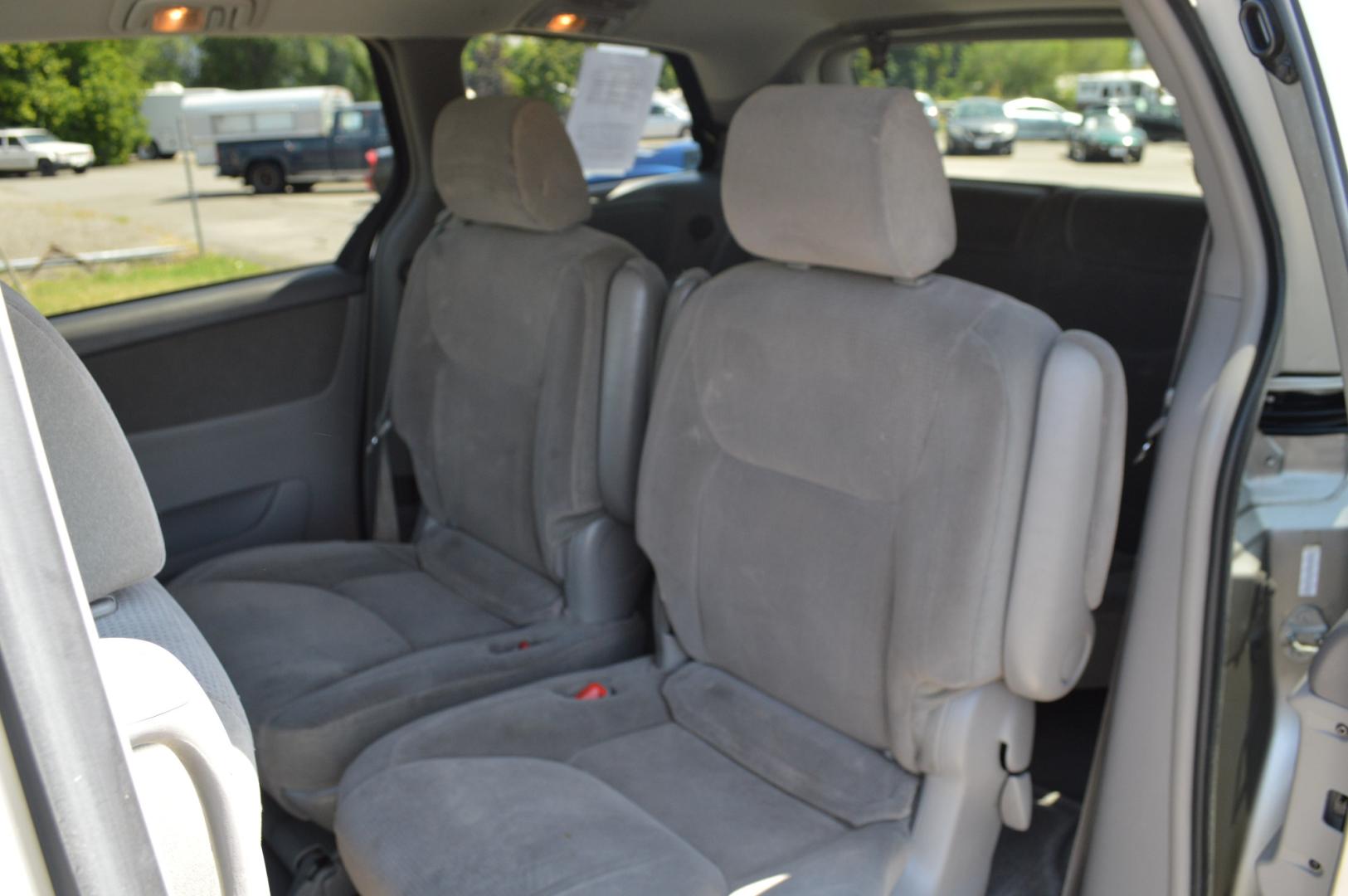 2004 Silver Toyota Sienna LE - 7 Passenger (5TDZA23C04S) with an 3.3L V6 DOHC 24V engine, 5-Speed Automatic Overdrive transmission, located at 450 N Russell, Missoula, MT, 59801, (406) 543-6600, 46.874496, -114.017433 - 3rd Row Seating. Rear Entertainment. Air. Cruise. Tilt. Power Windows. - Photo#11