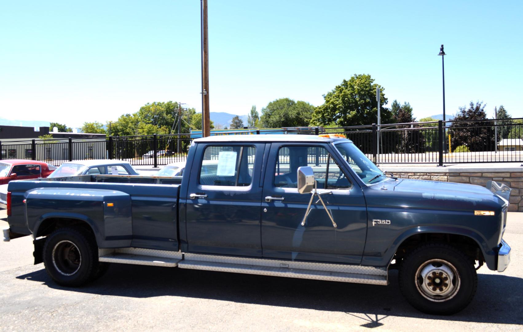 1986 Blue /Blue Ford F-350 Base (2FTJW35LXGC) with an 7.5L V8 OHV 16V engine, Automatic transmission, located at 450 N Russell, Missoula, MT, 59801, (406) 543-6600, 46.874496, -114.017433 - 1 Ton Dually Long Box CrewCab. Rear Wheel Drive. 7.5 Liter V8. Automatic Transmission. 43K Original Miles. Interior is close to Perfect. Clear Coat is pealing some. This vehicle is more then 20 years old and is not eligible for lending through our finance companies. - Photo#2