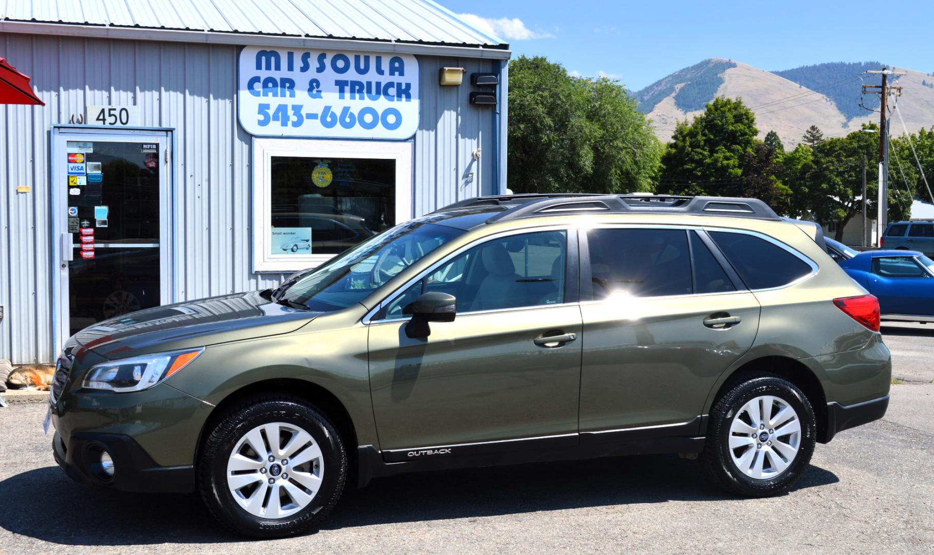 2015 Green /White Subaru Outback 2.5i Premium (4S4BSAFC5F3) with an 2.5L H4 DOHC 16V engine, 6-Speed Automatic transmission, located at 450 N Russell, Missoula, MT, 59801, (406) 543-6600, 46.874496, -114.017433 - Photo#0