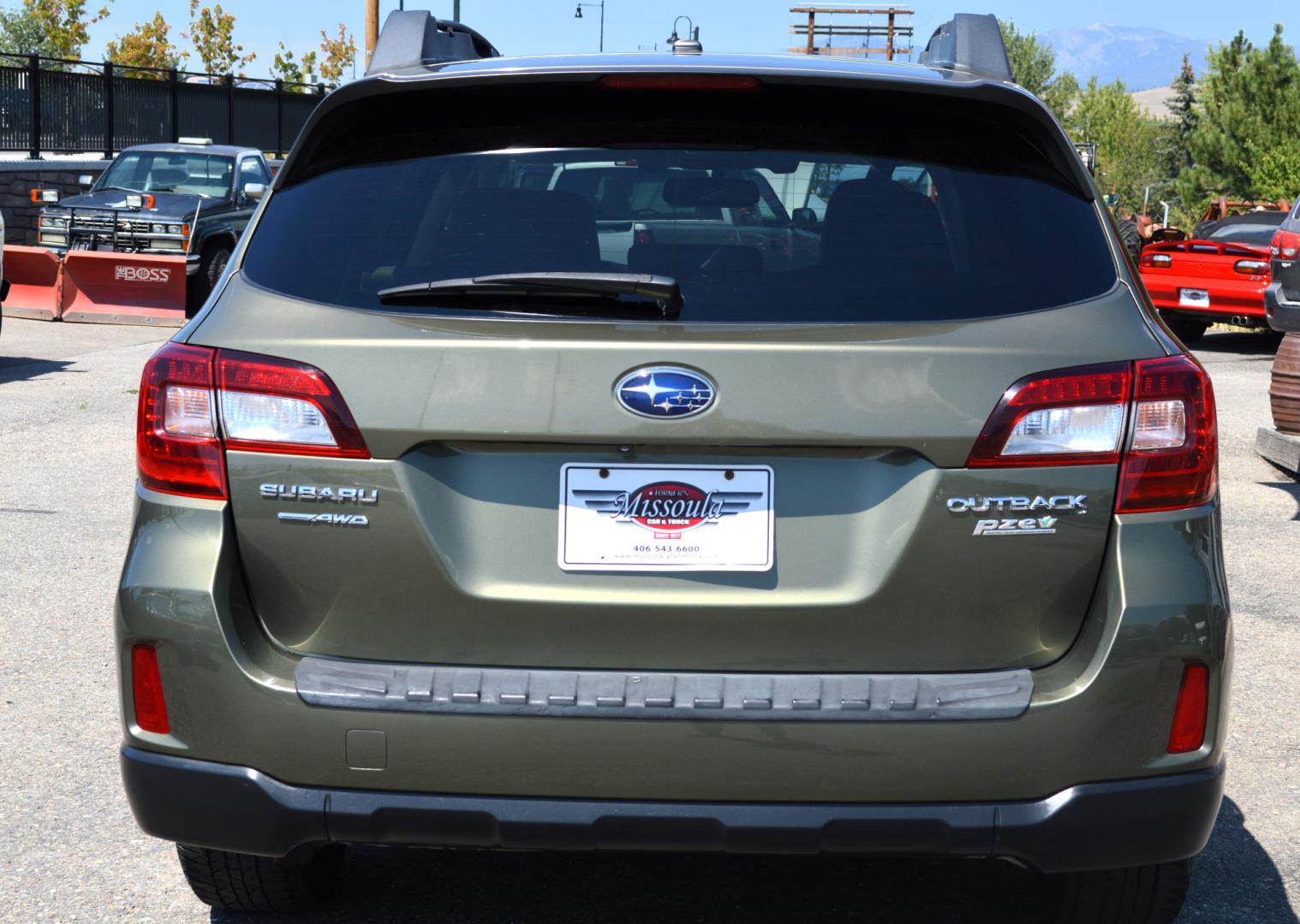 2015 Green /White Subaru Outback 2.5i Premium (4S4BSAFC5F3) with an 2.5L H4 DOHC 16V engine, 6-Speed Automatic transmission, located at 450 N Russell, Missoula, MT, 59801, (406) 543-6600, 46.874496, -114.017433 - Photo#6