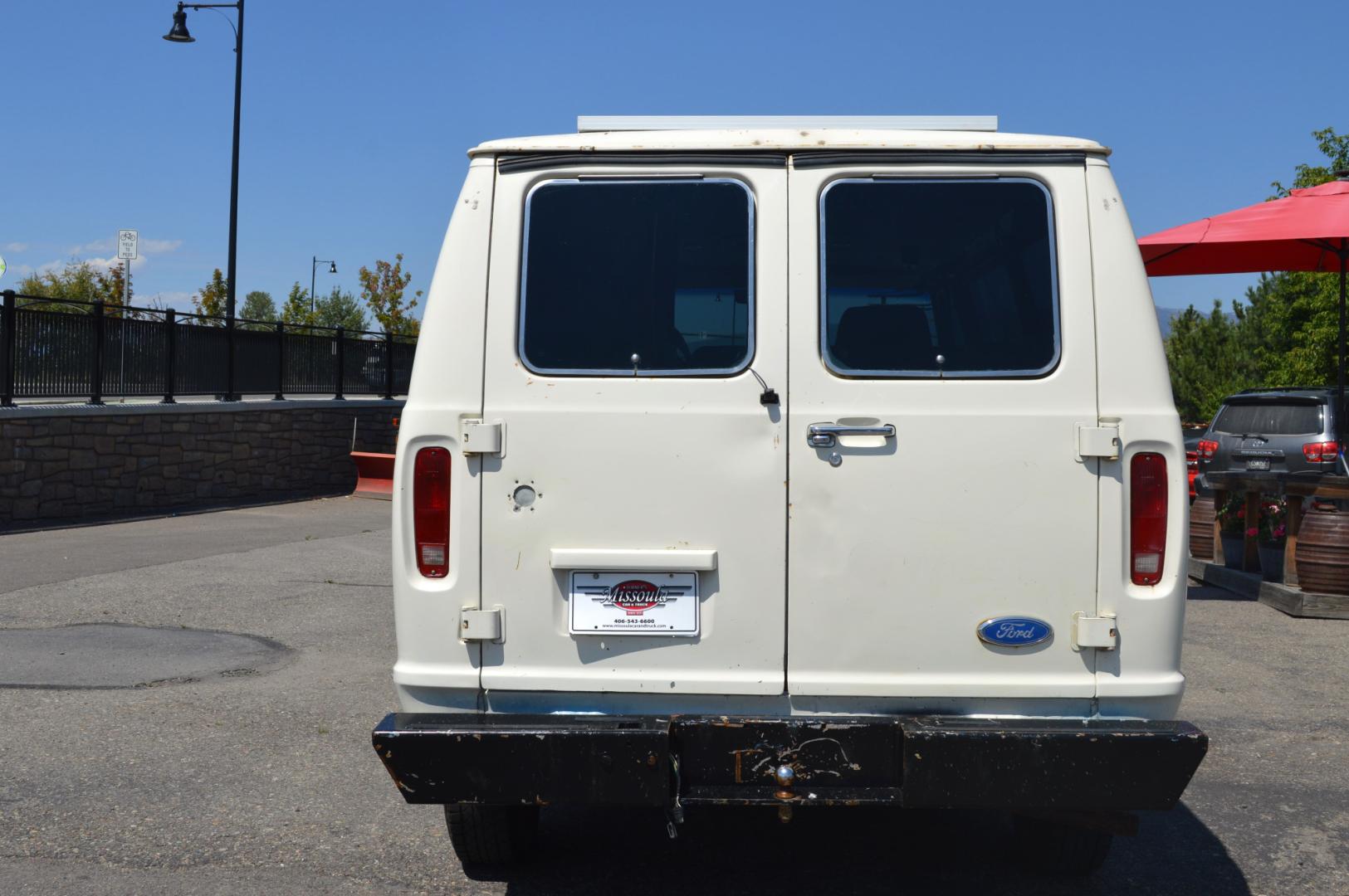 1990 White /Black Ford Econoline E250 (1FTFE24H6LH) with an 5.8L V8 OHV 16V engine, 4-Speed Automatic Overdrive transmission, located at 450 N Russell, Missoula, MT, 59801, (406) 543-6600, 46.874496, -114.017433 - Converted 3/4 Ton Ford Van. Has solar panels on top with a converter for power inside. Had a fold out bed. Comes with a sink that you hook to a 5 gallon water jug. Van Runs great. This vehicle is more then 20 years old and is not eligible for lending through our finance companies. - Photo#6