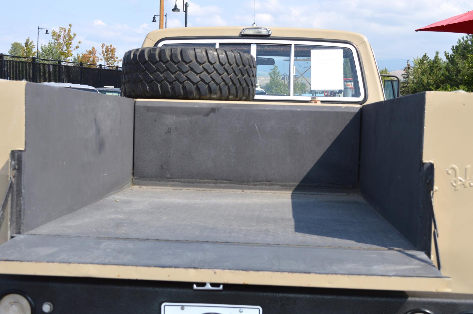 1975 Tan Ford F-100 F100 Ranger XLT (F11YRW21236) with an 390 engine, Automatic transmission, located at 450 N Russell, Missoula, MT, 59801, (406) 543-6600, 46.874496, -114.017433 - Such a Nice Truck. 13,000 Lb Winch. Utility Box. External Fuel Tank. Custom Headliner. AM FM CD Player. 460 Engine. Automatic Transmission. Warn Hubs. - Photo#8