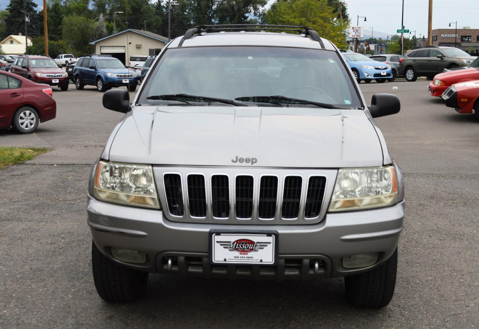 2001 Silver Jeep Grand Cherokee Limited 4WD (1J4GW58N71C) with an 4.7L V8 SOHC 16V engine, Automatic transmission, located at 450 N Russell, Missoula, MT, 59801, (406) 543-6600, 46.874496, -114.017433 - Nice SUV. 60th Anniversary Edition. Automatic Transmission. Power Sunroof. Air. Cruise. Tilt. Power Windows and Locks. Power Leather Seats. Heated Seats. This vehicle is more then 20 years old and is not eligible for lending through our finance companies. - Photo#2