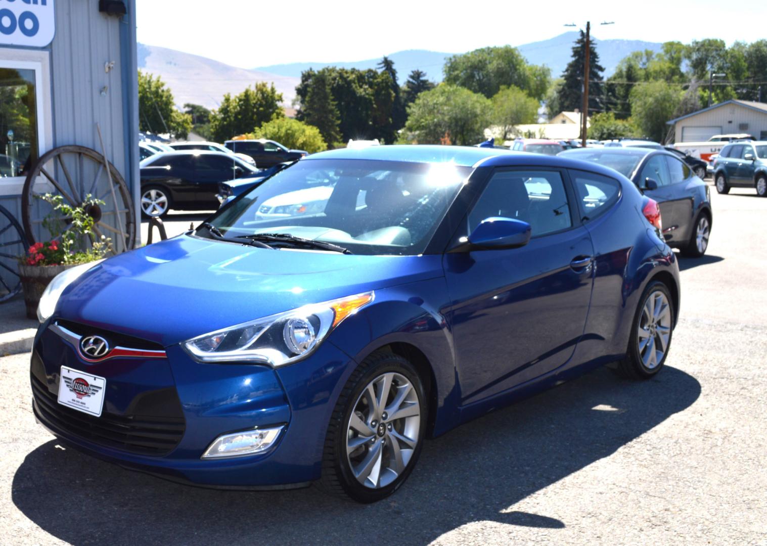 2017 Blue /Black Hyundai Veloster Base 6MT (KMHTC6AD2HU) with an 1.6L L4 DOHC 16V engine, 6M Automatic transmission, located at 450 N Russell, Missoula, MT, 59801, (406) 543-6600, 46.874496, -114.017433 - Cute Little Coupe. 3 Doors. Automatic Transmission. Air. Cruise. Tilt. Power Windows and Locks. Bluetooth. Backup Camera. - Photo#1