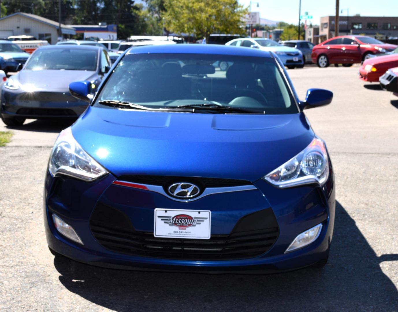 2017 Blue /Black Hyundai Veloster Base 6MT (KMHTC6AD2HU) with an 1.6L L4 DOHC 16V engine, 6M Automatic transmission, located at 450 N Russell, Missoula, MT, 59801, (406) 543-6600, 46.874496, -114.017433 - Cute Little Coupe. 3 Doors. Automatic Transmission. Air. Cruise. Tilt. Power Windows and Locks. Bluetooth. Backup Camera. - Photo#2