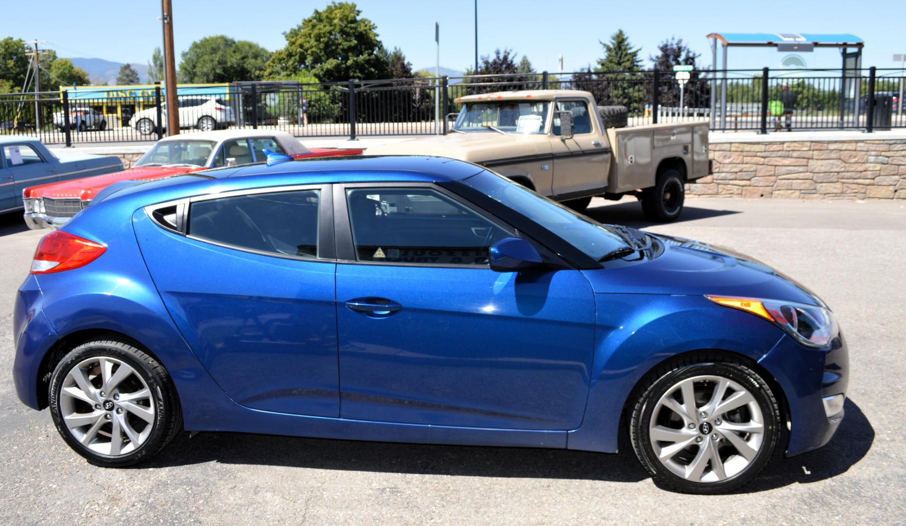 2017 Blue /Black Hyundai Veloster Base 6MT (KMHTC6AD2HU) with an 1.6L L4 DOHC 16V engine, 6M Automatic transmission, located at 450 N Russell, Missoula, MT, 59801, (406) 543-6600, 46.874496, -114.017433 - Cute Little Coupe. 3 Doors. Automatic Transmission. Air. Cruise. Tilt. Power Windows and Locks. Bluetooth. Backup Camera. - Photo#3