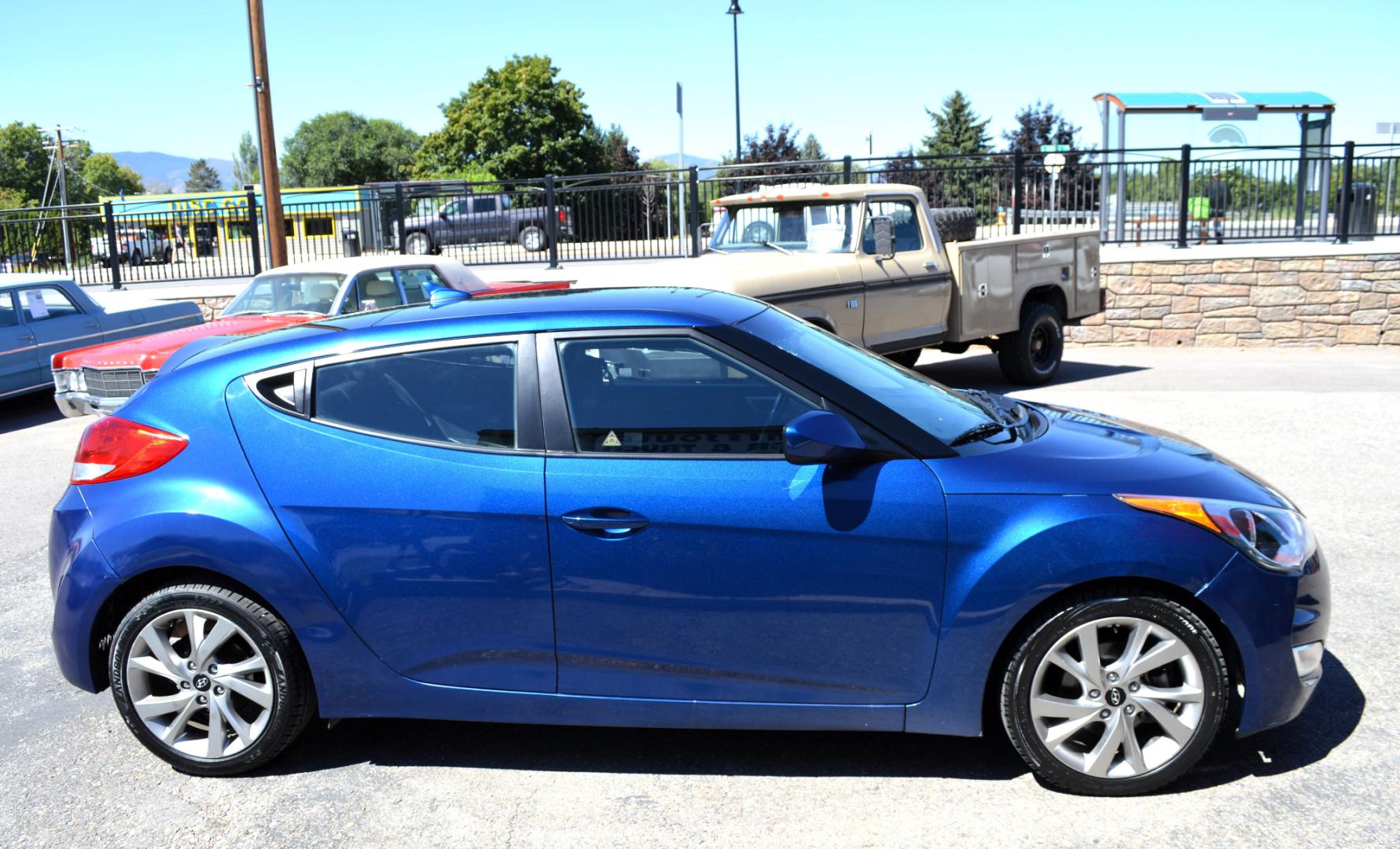 2017 Blue /Black Hyundai Veloster Base 6MT (KMHTC6AD2HU) with an 1.6L L4 DOHC 16V engine, 6M Automatic transmission, located at 450 N Russell, Missoula, MT, 59801, (406) 543-6600, 46.874496, -114.017433 - Cute Little Coupe. 3 Doors. Automatic Transmission. Air. Cruise. Tilt. Power Windows and Locks. Bluetooth. Backup Camera. - Photo#4