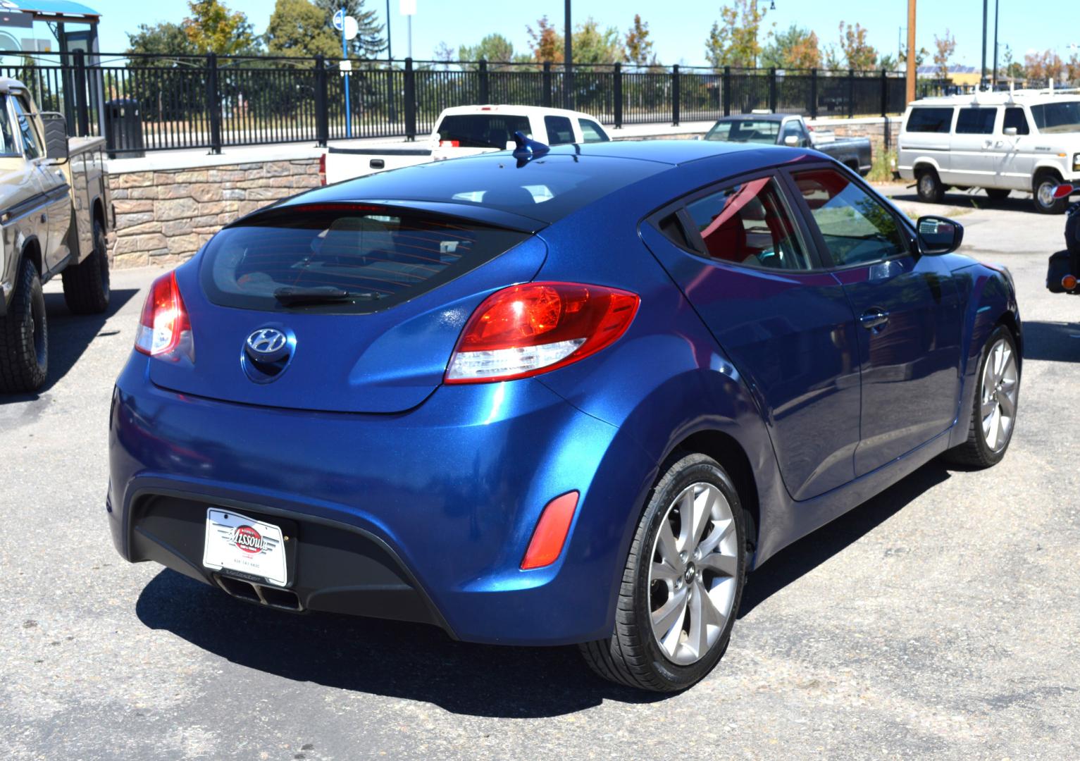 2017 Blue /Black Hyundai Veloster Base 6MT (KMHTC6AD2HU) with an 1.6L L4 DOHC 16V engine, 6M Automatic transmission, located at 450 N Russell, Missoula, MT, 59801, (406) 543-6600, 46.874496, -114.017433 - Cute Little Coupe. 3 Doors. Automatic Transmission. Air. Cruise. Tilt. Power Windows and Locks. Bluetooth. Backup Camera. - Photo#5