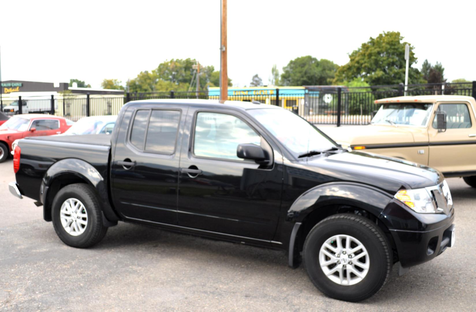 2017 Black /Tan Nissan Frontier SL Crew Cab 5AT 2WD (1N6AD0ER4HN) with an 4.0L V6 DOHC 24V engine, 5A transmission, located at 450 N Russell, Missoula, MT, 59801, (406) 543-6600, 46.874496, -114.017433 - Photo#1