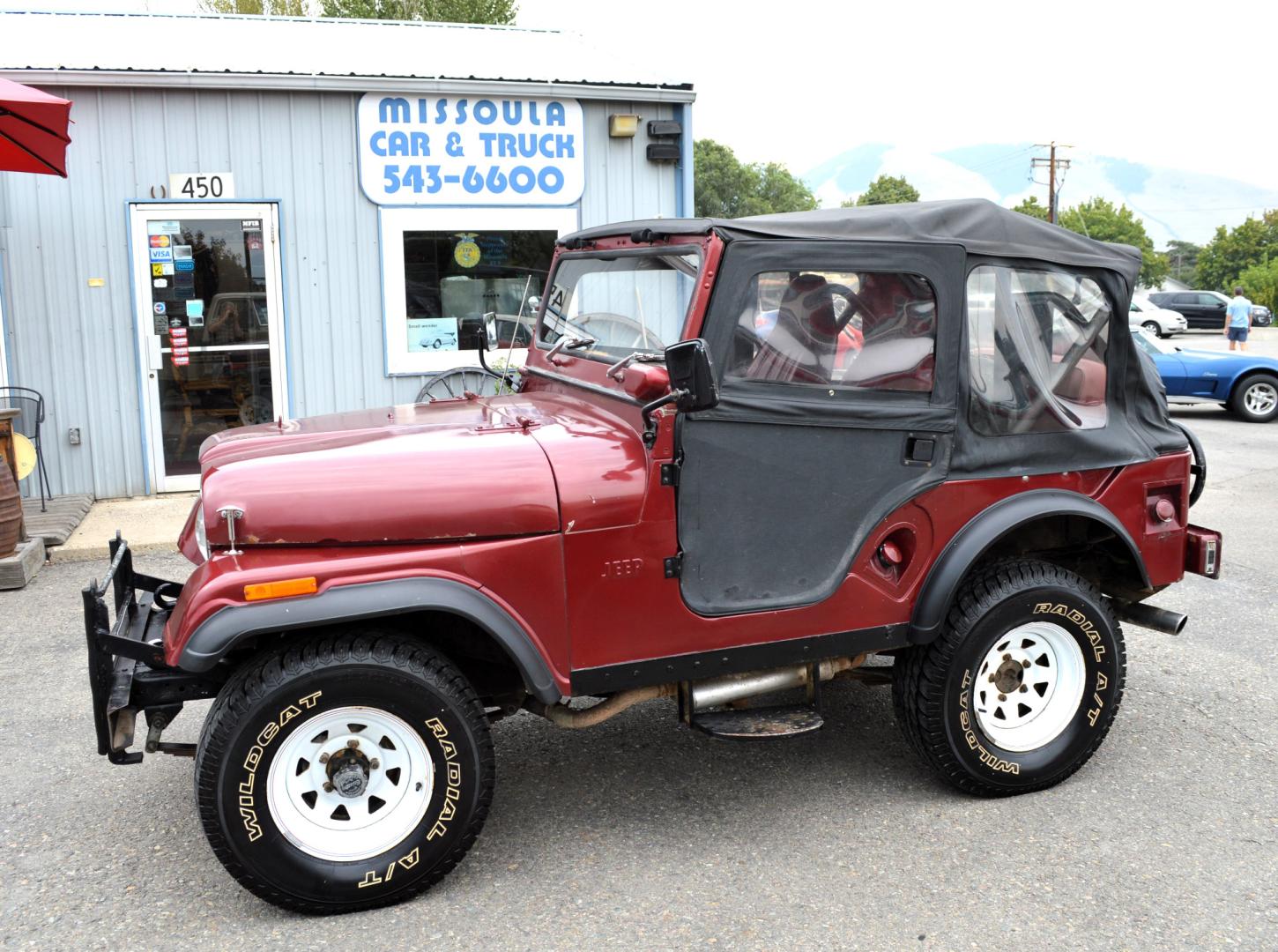 1969 Maroon Jeep CJ5 (83050173554) with an 235 6 Cylinder engine, 3 Speed Manual transmission, located at 450 N Russell, Missoula, MT, 59801, (406) 543-6600, 46.874496, -114.017433 - Photo#0