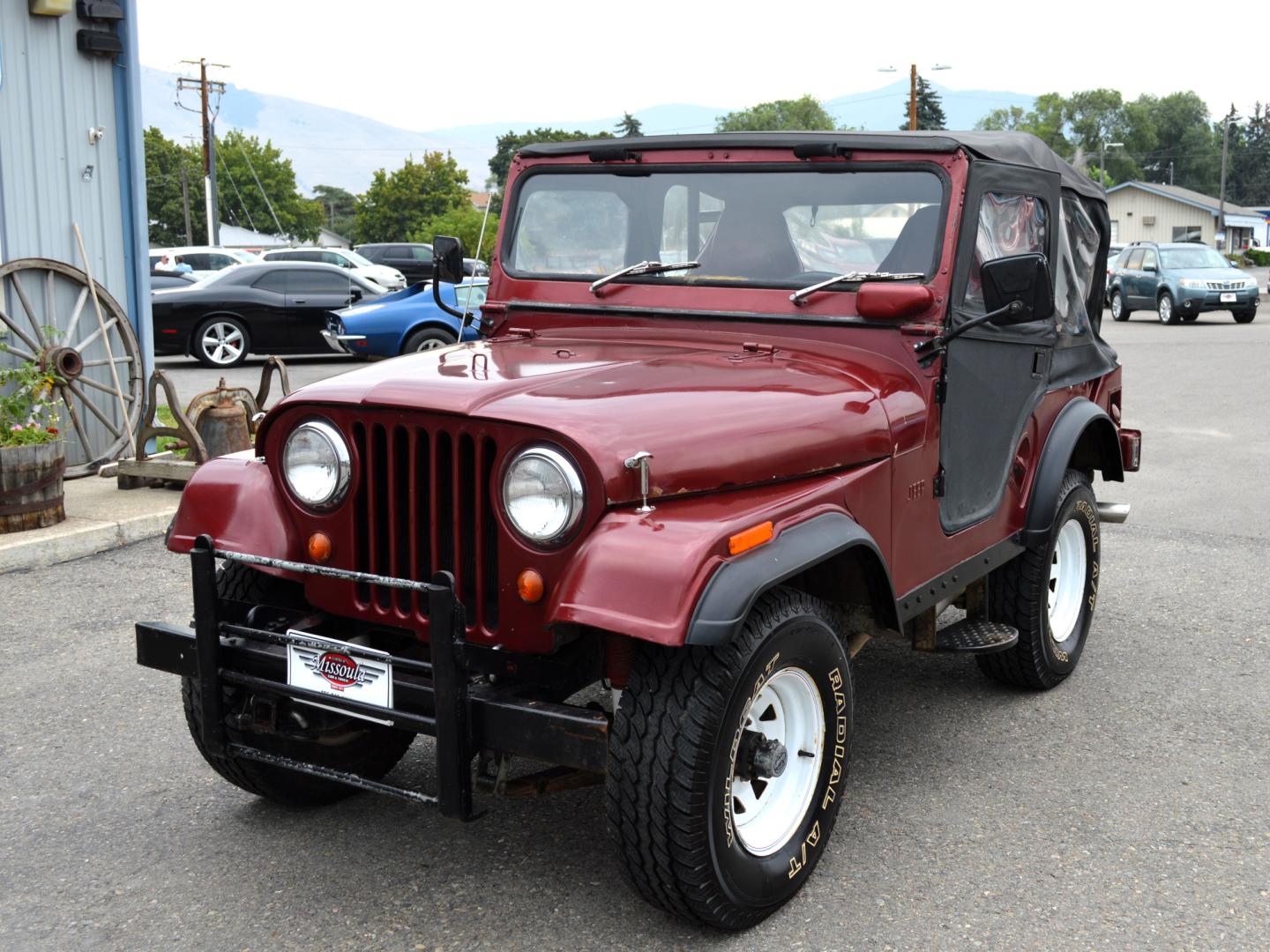 1969 Maroon Jeep CJ5 (83050173554) with an 235 6 Cylinder engine, 3 Speed Manual transmission, located at 450 N Russell, Missoula, MT, 59801, (406) 543-6600, 46.874496, -114.017433 - Photo#1