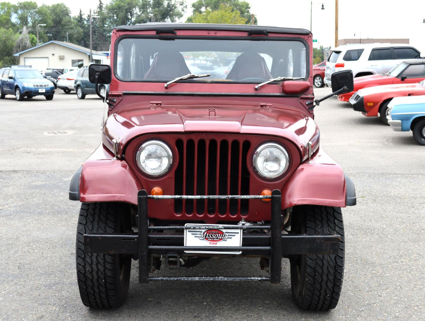 1969 Maroon Jeep CJ5 (83050173554) with an 235 6 Cylinder engine, 3 Speed Manual transmission, located at 450 N Russell, Missoula, MT, 59801, (406) 543-6600, 46.874496, -114.017433 - Photo#2