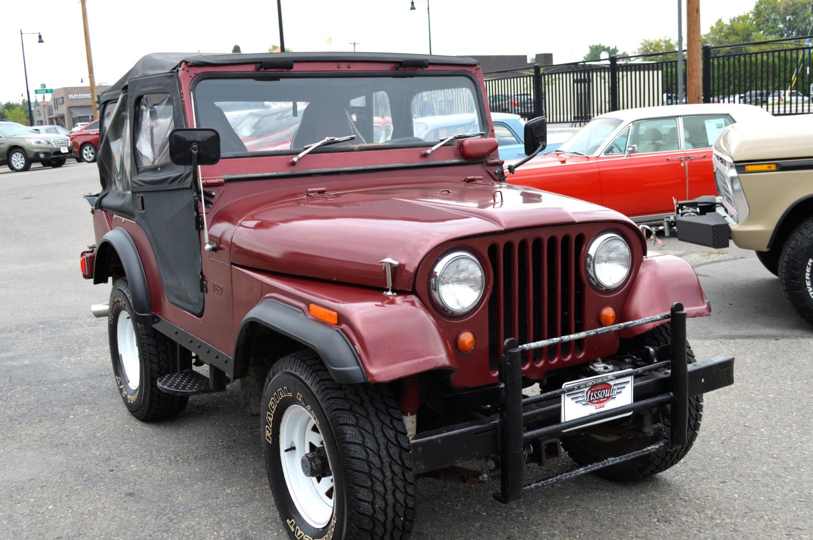 1969 Maroon Jeep CJ5 (83050173554) with an 235 6 Cylinder engine, 3 Speed Manual transmission, located at 450 N Russell, Missoula, MT, 59801, (406) 543-6600, 46.874496, -114.017433 - Photo#3