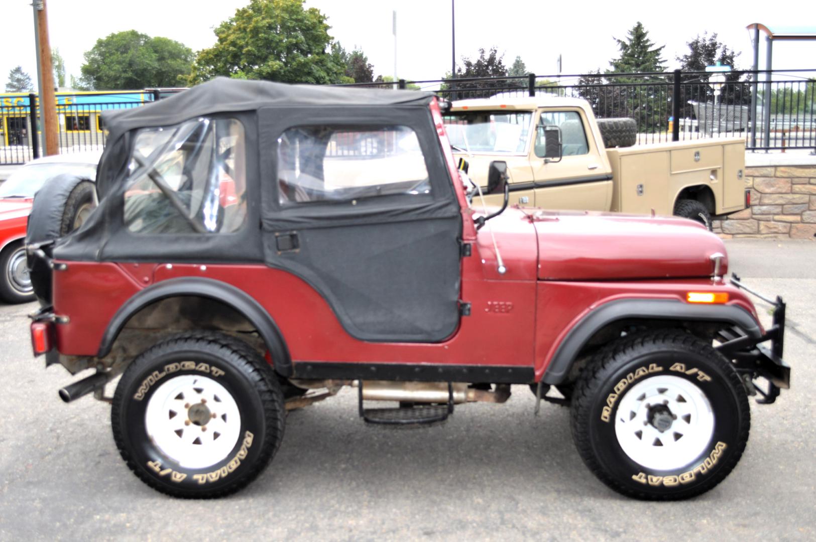 1969 Maroon Jeep CJ5 (83050173554) with an 235 6 Cylinder engine, 3 Speed Manual transmission, located at 450 N Russell, Missoula, MT, 59801, (406) 543-6600, 46.874496, -114.017433 - Photo#5