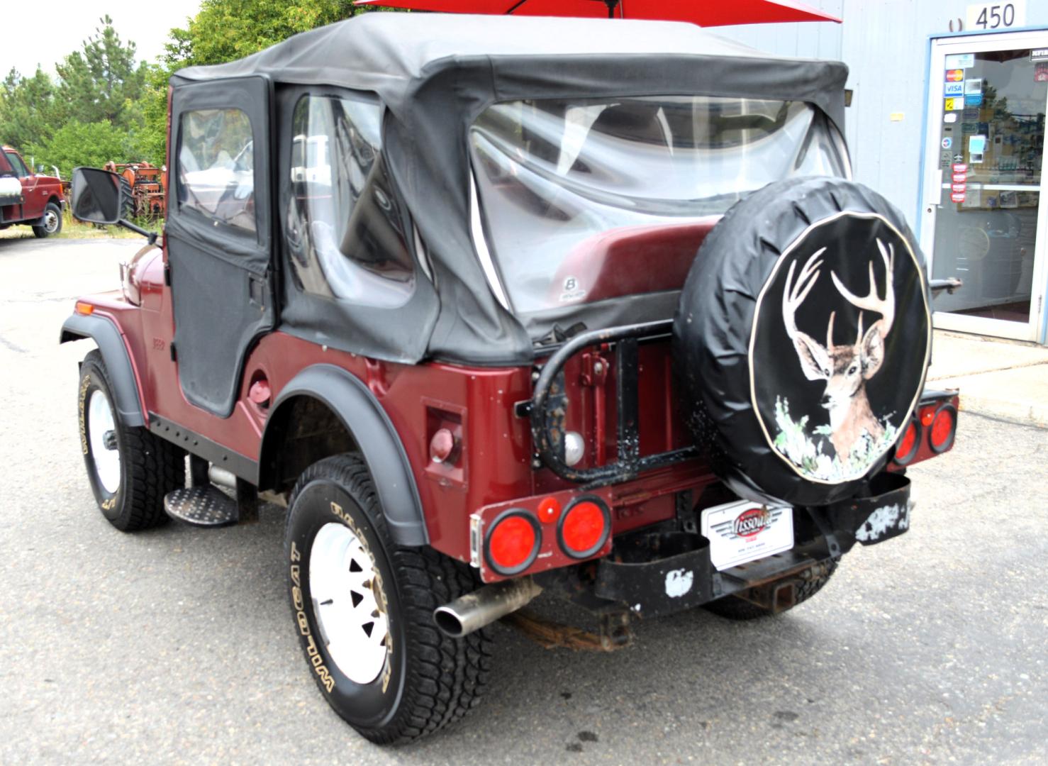 1969 Maroon Jeep CJ5 (83050173554) with an 235 6 Cylinder engine, 3 Speed Manual transmission, located at 450 N Russell, Missoula, MT, 59801, (406) 543-6600, 46.874496, -114.017433 - Photo#7