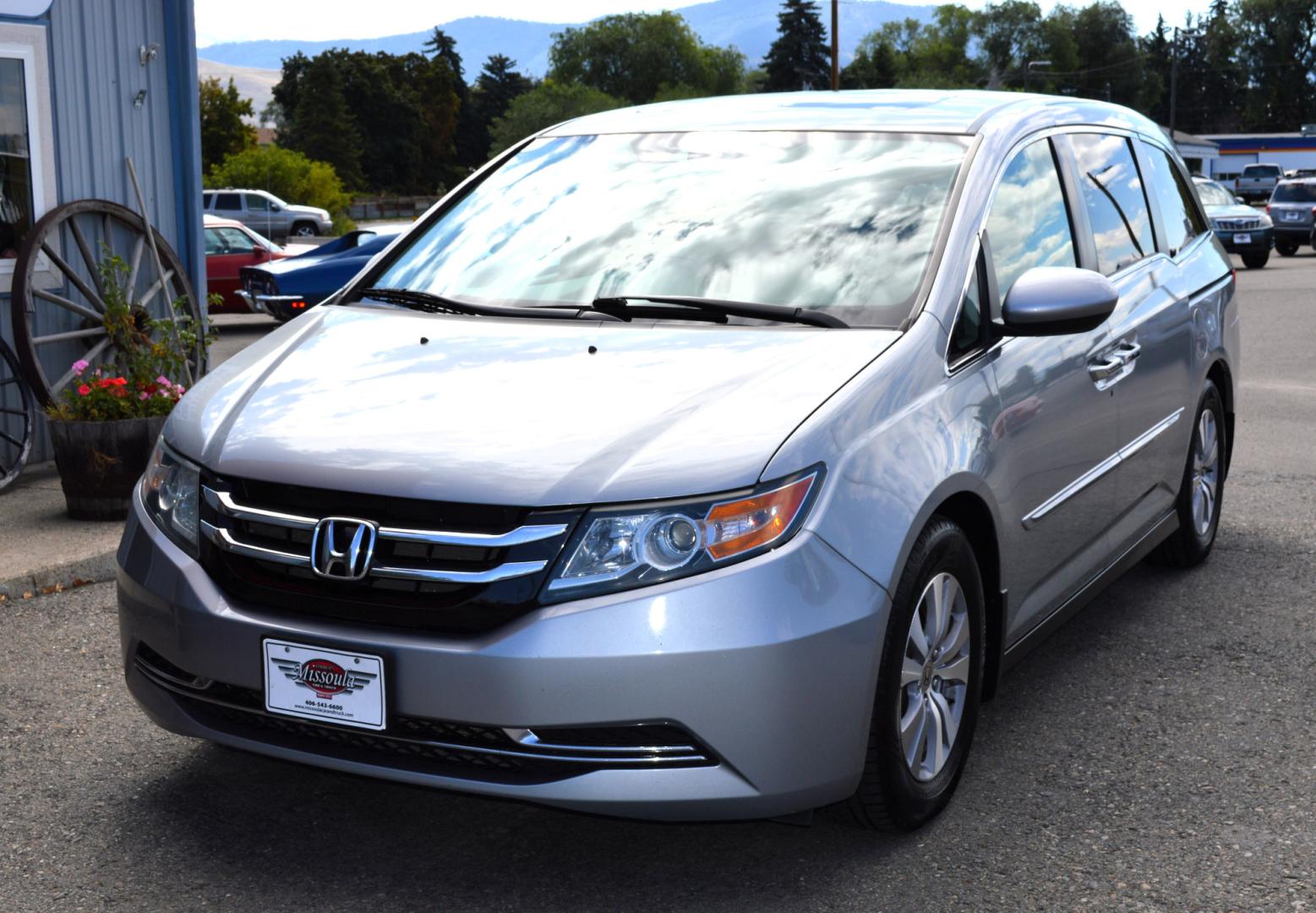 2016 Silver Honda Odyssey EX-L (5FNRL5H6XGB) with an 3.5L V6 SOHC 24V engine, 6A transmission, located at 450 N Russell, Missoula, MT, 59801, (406) 543-6600, 46.874496, -114.017433 - Beautiful Van. Brand NEW Timing Belt. 6 Speed Automatic Transmission. Power Sunroof. 3rd Row Seating. Power Sliding Side Doors. Air. Cruise. Tilt. Power Leather Seats. Stow and Go Rear Seats. - Photo#1