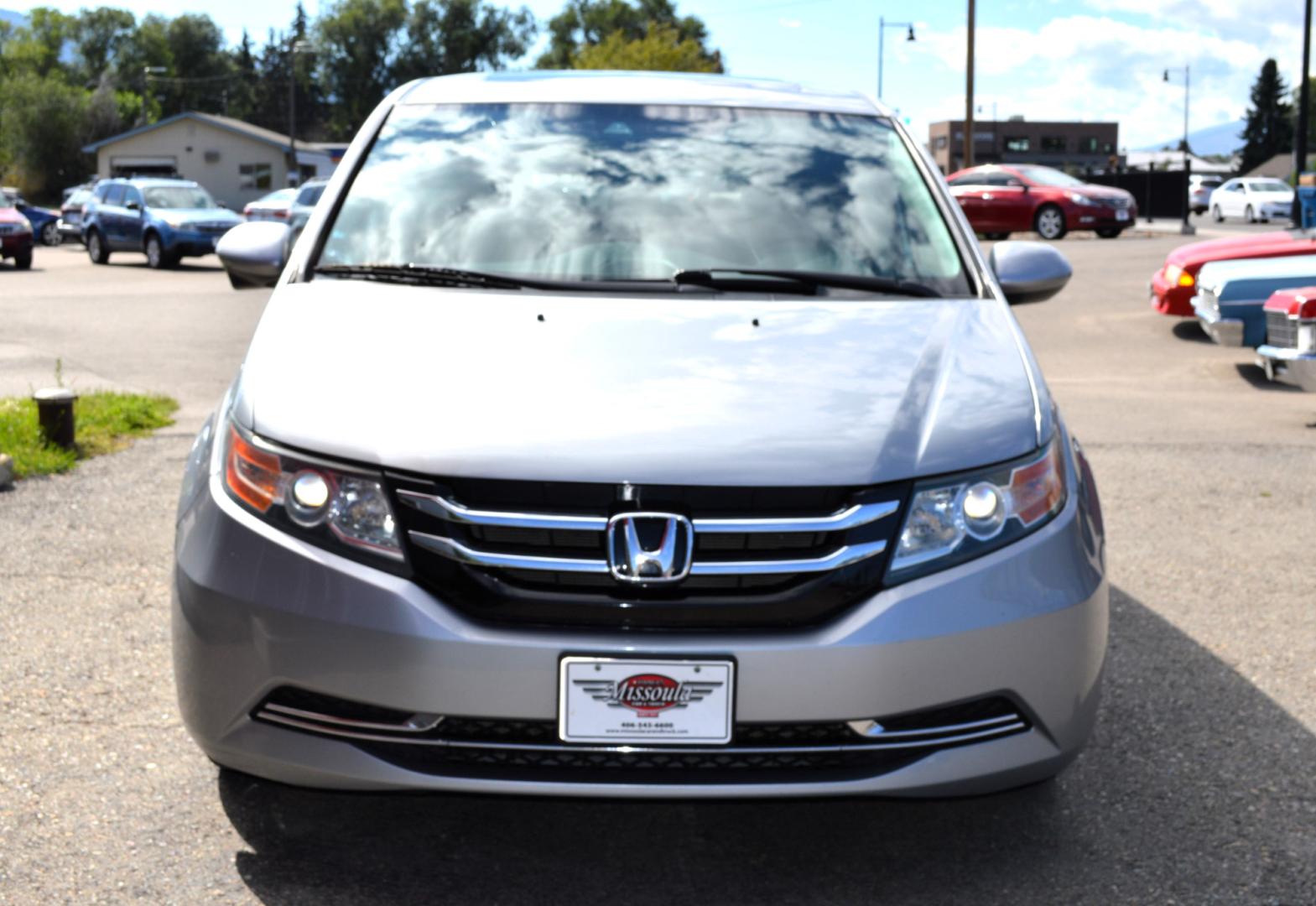 2016 Silver Honda Odyssey EX-L (5FNRL5H6XGB) with an 3.5L V6 SOHC 24V engine, 6A transmission, located at 450 N Russell, Missoula, MT, 59801, (406) 543-6600, 46.874496, -114.017433 - Beautiful Van. Brand NEW Timing Belt. 6 Speed Automatic Transmission. Power Sunroof. 3rd Row Seating. Power Sliding Side Doors. Air. Cruise. Tilt. Power Leather Seats. Stow and Go Rear Seats. - Photo#3