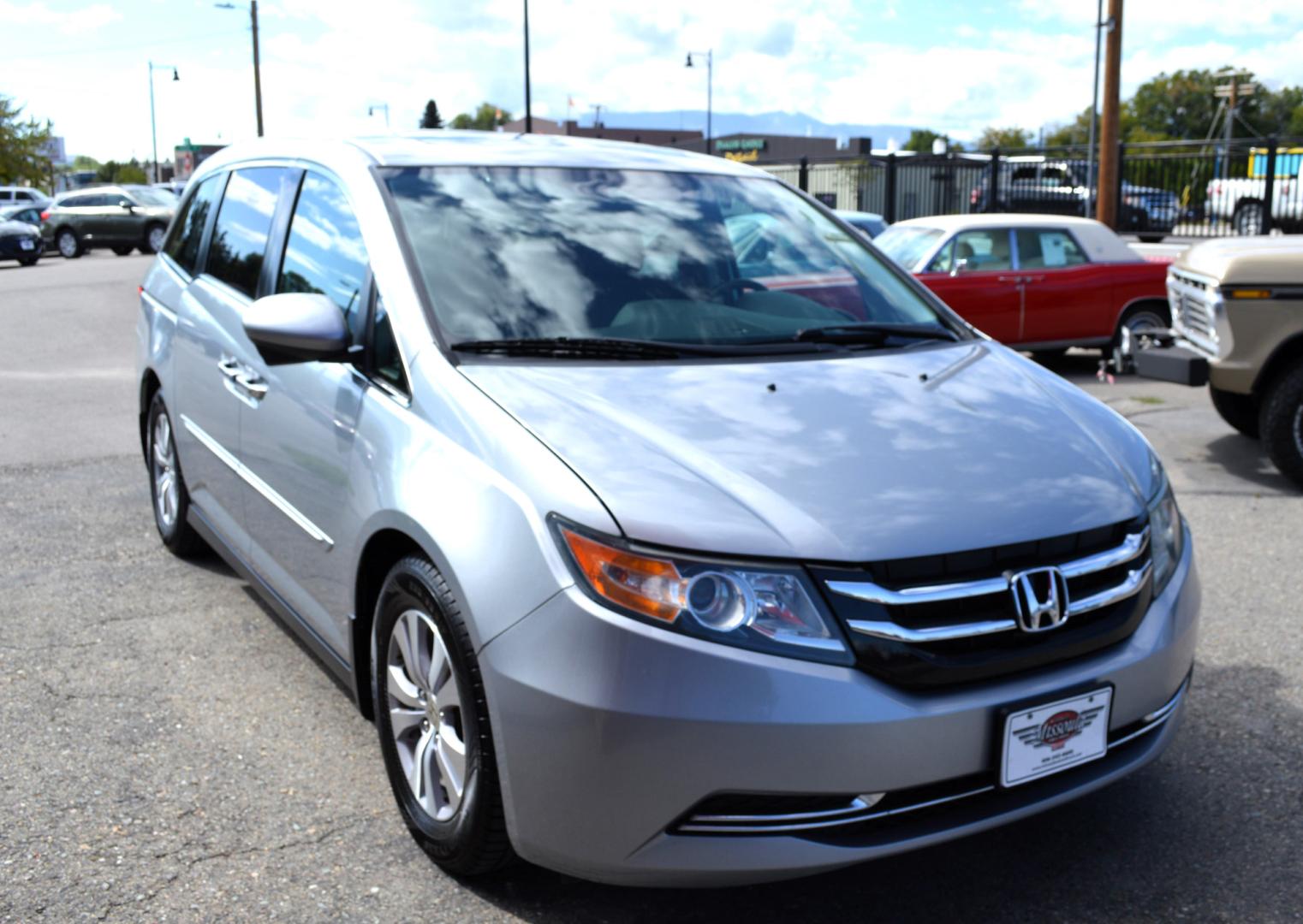 2016 Silver Honda Odyssey EX-L (5FNRL5H6XGB) with an 3.5L V6 SOHC 24V engine, 6A transmission, located at 450 N Russell, Missoula, MT, 59801, (406) 543-6600, 46.874496, -114.017433 - Beautiful Van. Brand NEW Timing Belt. 6 Speed Automatic Transmission. Power Sunroof. 3rd Row Seating. Power Sliding Side Doors. Air. Cruise. Tilt. Power Leather Seats. Stow and Go Rear Seats. - Photo#4