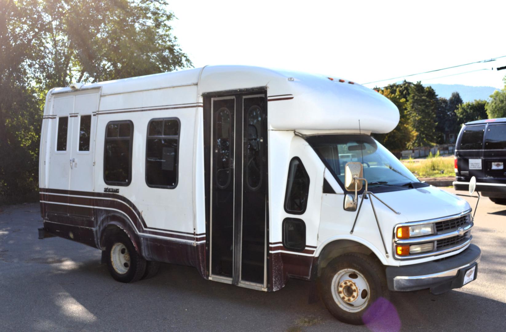 1998 White Chevrolet Express G3500 (1GBJG31J4W1) with an 7.4L V8 OHV 16V engine, 4-Speed Automatic Overdrive transmission, located at 450 N Russell, Missoula, MT, 59801, (406) 543-6600, 46.874496, -114.017433 - Great running Handi-Cap Mini Bus on Chevy 1 Ton Dually. Hydraulic Wheel Chair Lift. Rear Seats fold up out of the way for more room. Front and Rear Air Conditioning. This vehicle is more then 20 years old and is not eligible for lending through our finance companies. - Photo#0