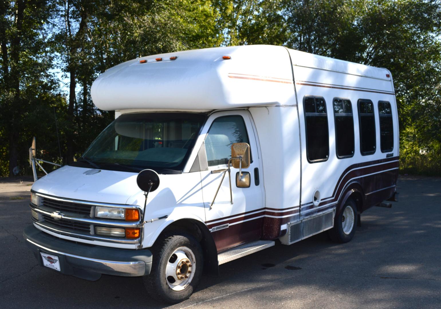 1998 White Chevrolet Express G3500 (1GBJG31J4W1) with an 7.4L V8 OHV 16V engine, 4-Speed Automatic Overdrive transmission, located at 450 N Russell, Missoula, MT, 59801, (406) 543-6600, 46.874496, -114.017433 - Great running Handi-Cap Mini Bus on Chevy 1 Ton Dually. Hydraulic Wheel Chair Lift. Rear Seats fold up out of the way for more room. Front and Rear Air Conditioning. This vehicle is more then 20 years old and is not eligible for lending through our finance companies. - Photo#6