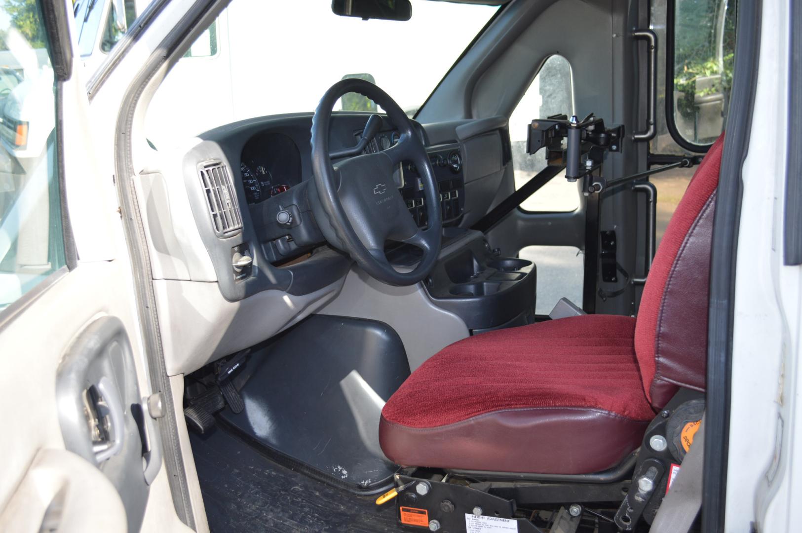 1998 White Chevrolet Express G3500 (1GBJG31J4W1) with an 7.4L V8 OHV 16V engine, 4-Speed Automatic Overdrive transmission, located at 450 N Russell, Missoula, MT, 59801, (406) 543-6600, 46.874496, -114.017433 - Great running Handi-Cap Mini Bus on Chevy 1 Ton Dually. Hydraulic Wheel Chair Lift. Rear Seats fold up out of the way for more room. Front and Rear Air Conditioning. This vehicle is more then 20 years old and is not eligible for lending through our finance companies. - Photo#8